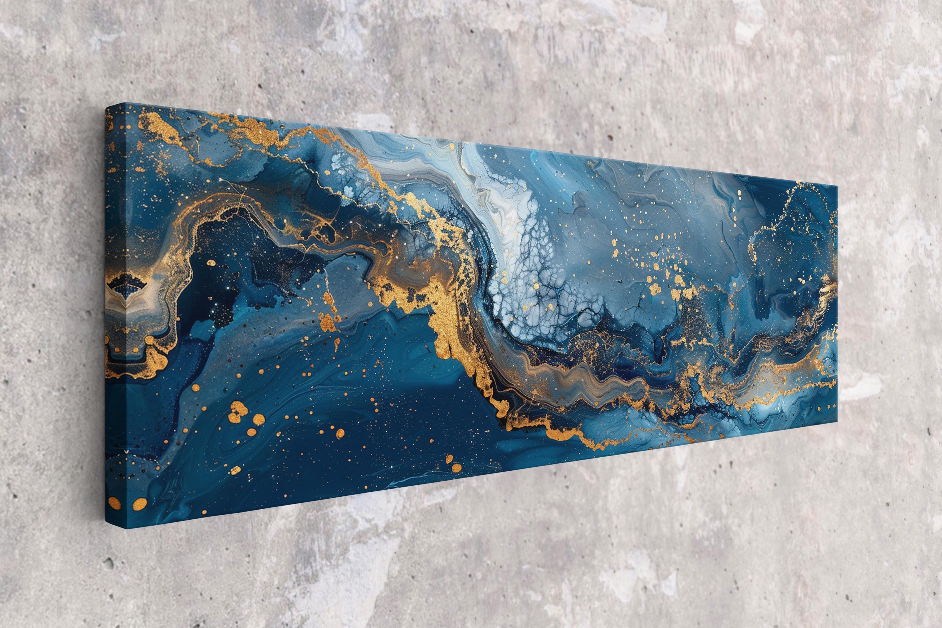 a blue and gold painting on a wall