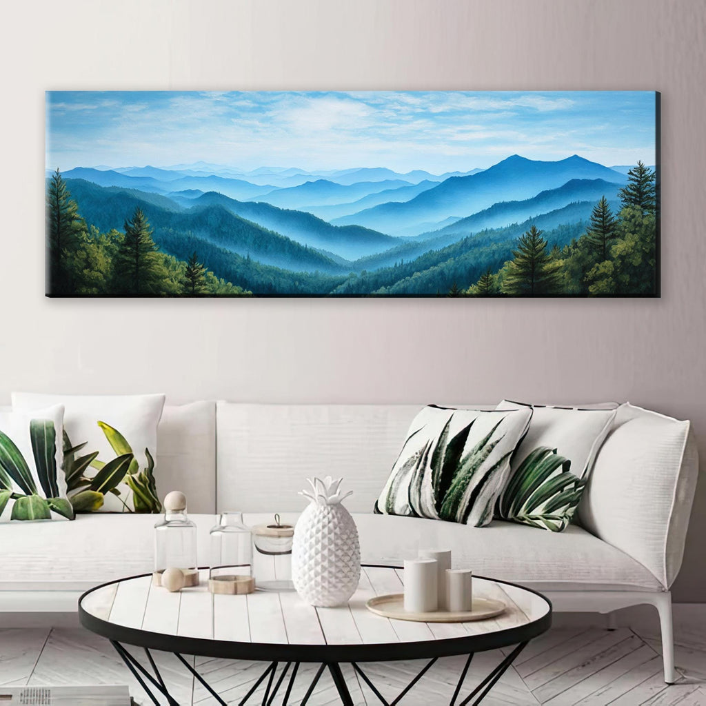 a living room with a white couch and a painting on the wall