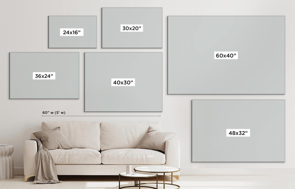 a living room with a white couch and a white wall