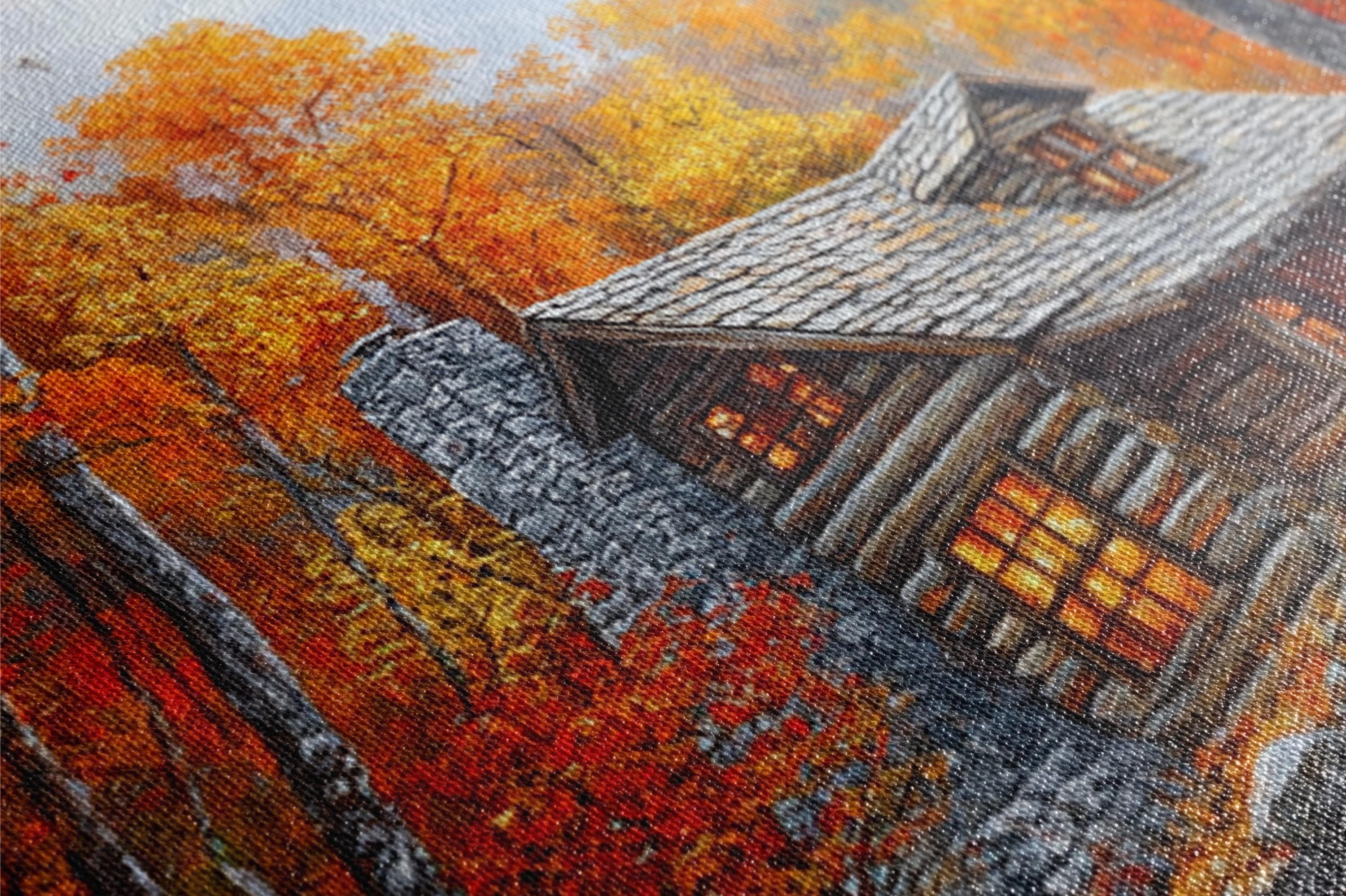 a rustic cabin nestled in a vibrant autumn landscape, with the cabin's windows glowing warmly against the backdrop of colorful trees.
