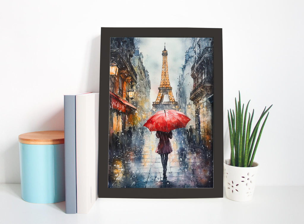 a framed painting of a woman walking with a red umbrella in front of the Eiffel Tower on a rainy day in Paris.