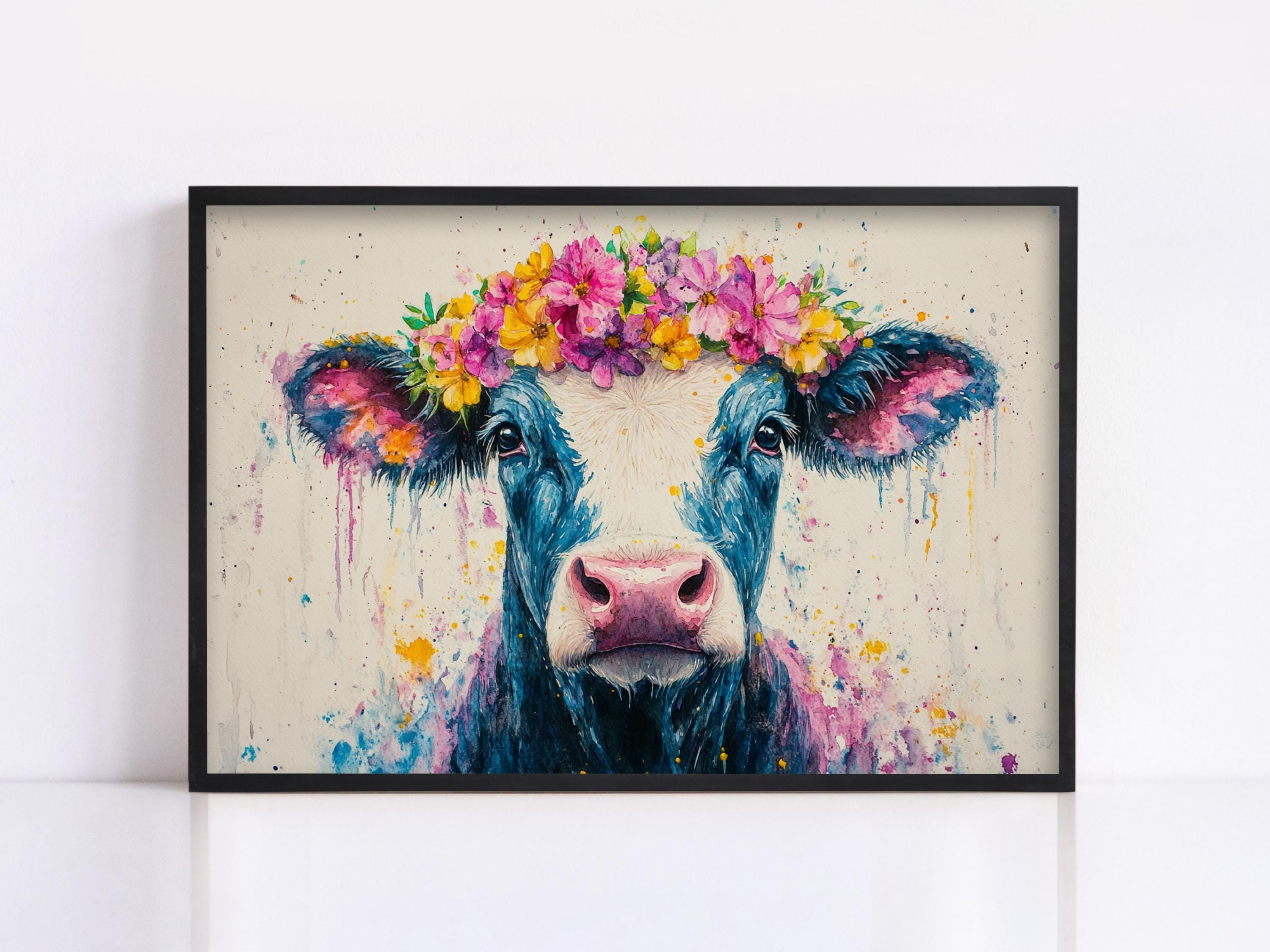 A framed painting of a cow with a colorful flower crown on its head.