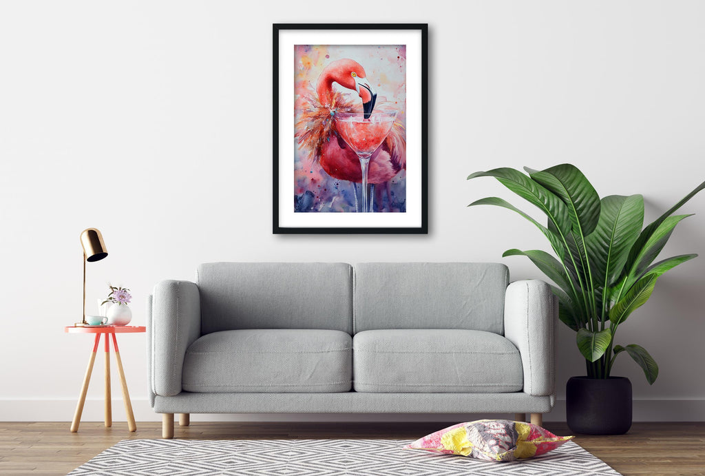 a gray sofa, a framed painting of a pink flamingo, a small table with a lamp, and a potted plant, all arranged in a living room setting.