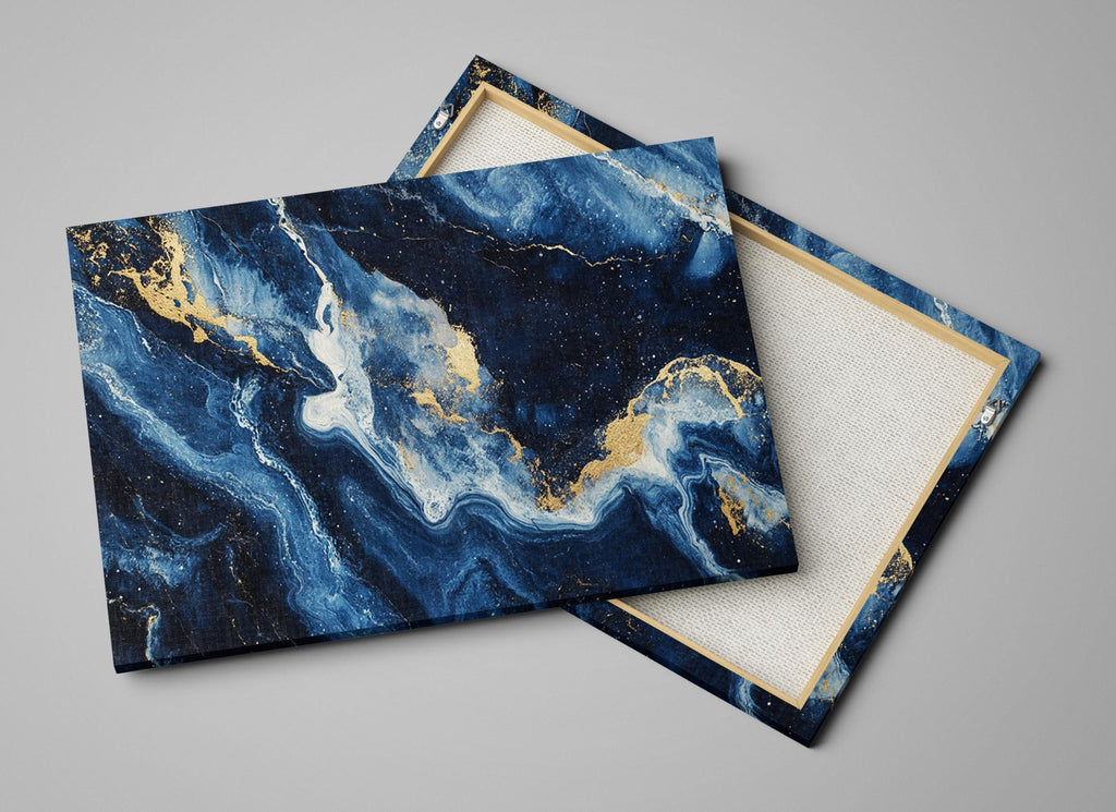 a pair of blue and gold marbled coasters