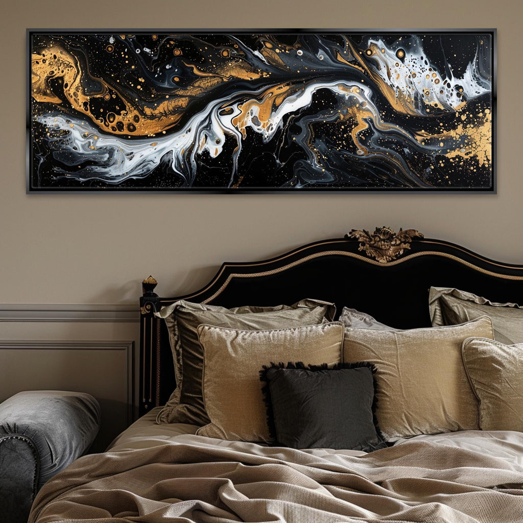 a bed with pillows and a painting on the wall above it