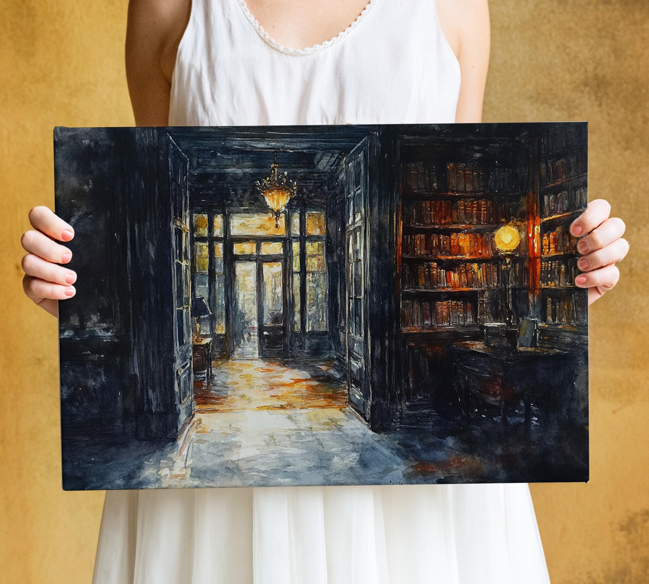 A woman holds a painting of a library with a warm, inviting atmosphere, featuring a bookshelf filled with books and a chandelier hanging from the ceiling.