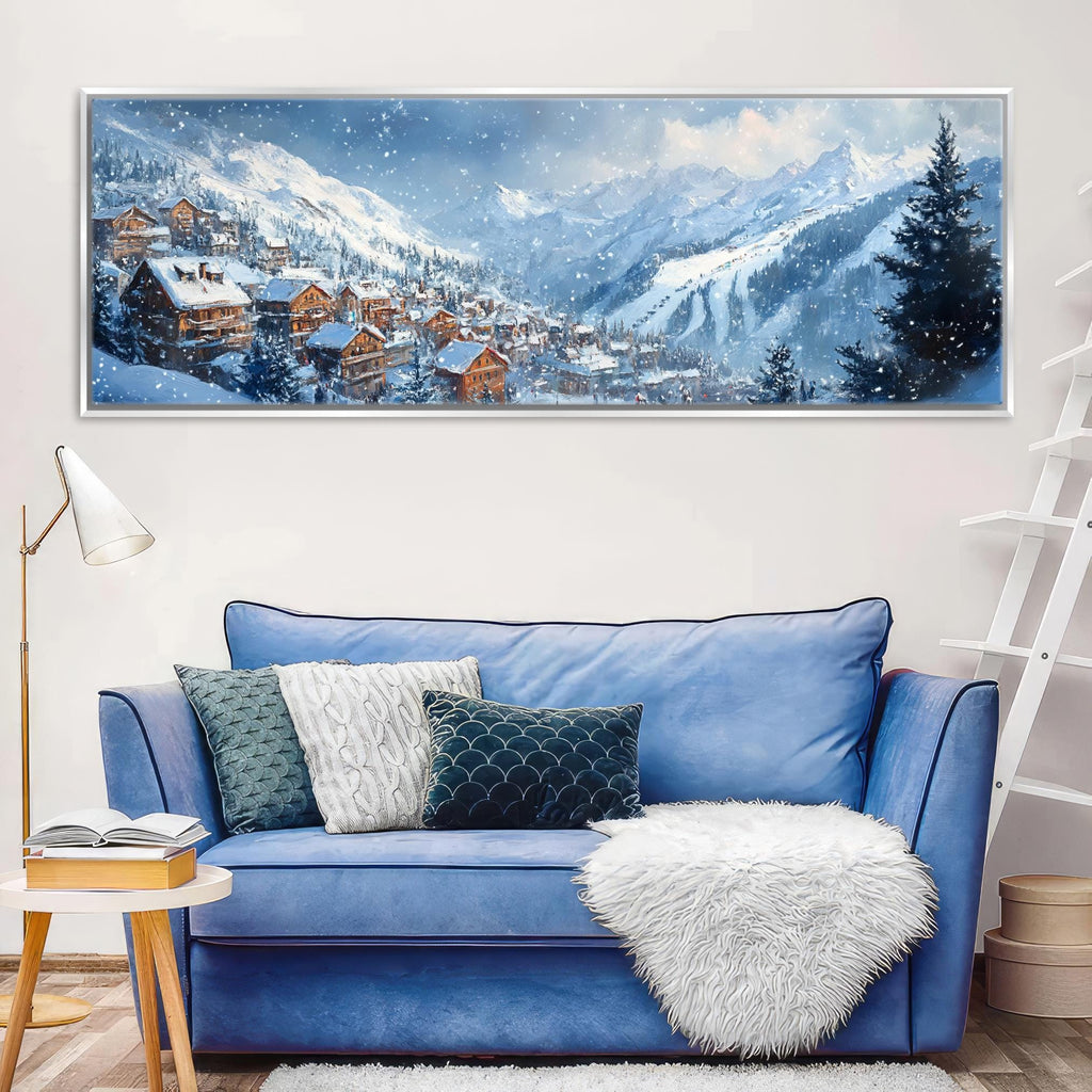a living room with a blue couch and a painting on the wall