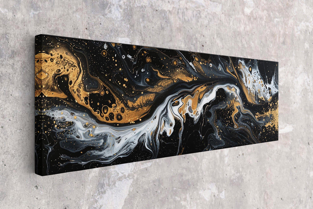 a black and gold painting on a wall