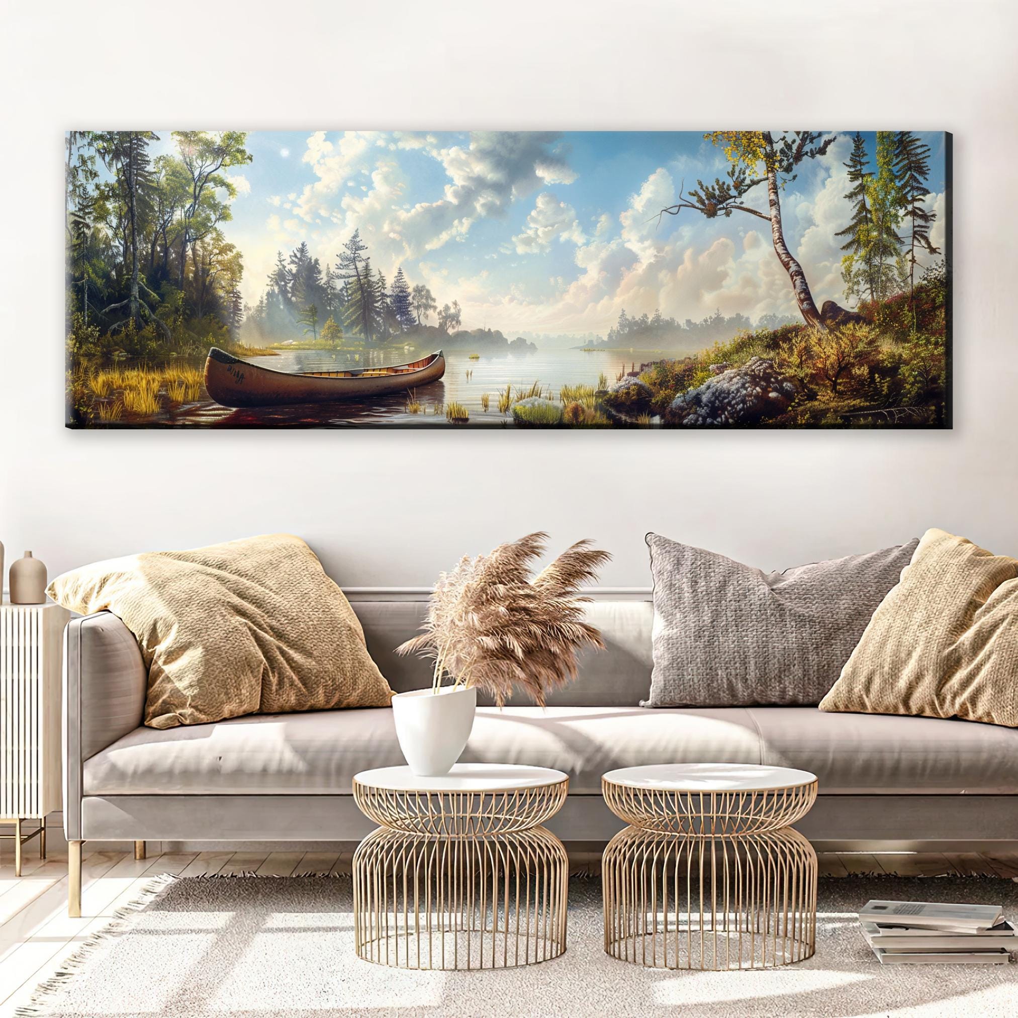a living room with a couch and a painting on the wall