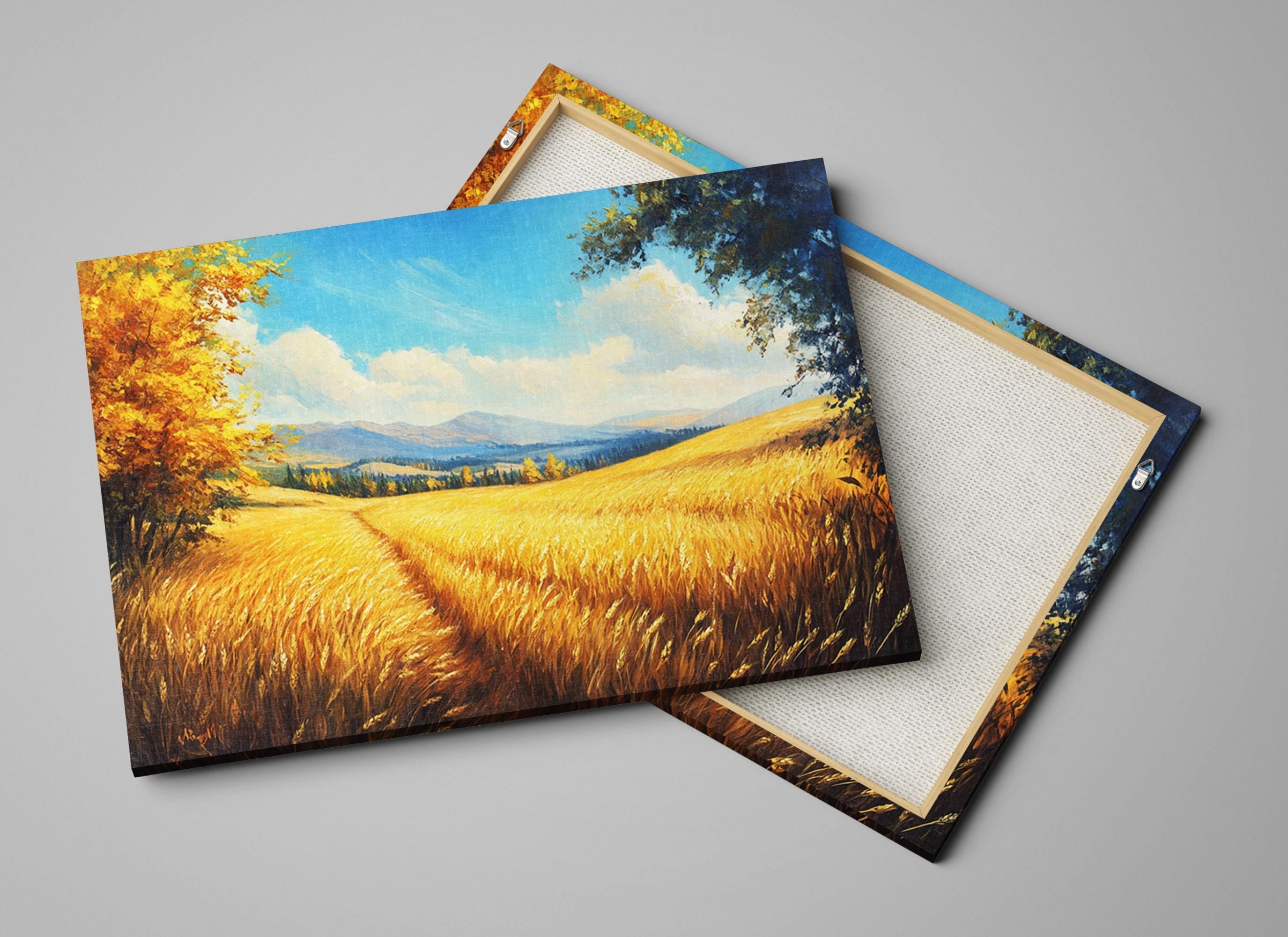 a serene landscape with a field of golden wheat stretching out towards a distant mountain range under a blue sky with fluffy white clouds.