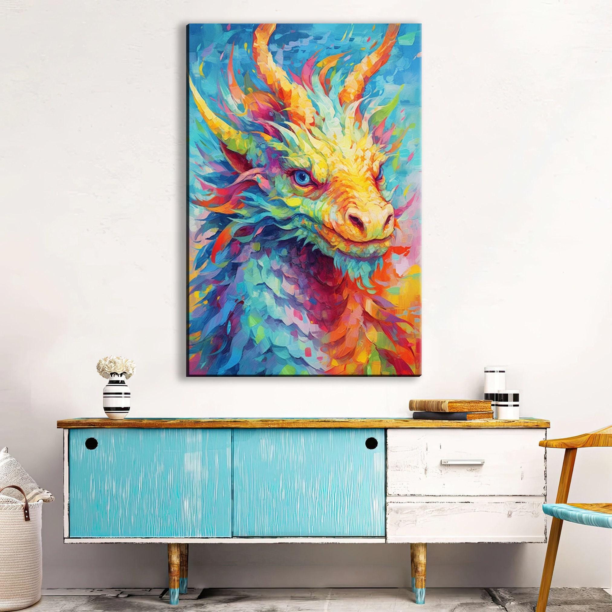 a vibrant, colorful painting of a dragon-like creature hanging on a wall above a blue cabinet with a wooden top.