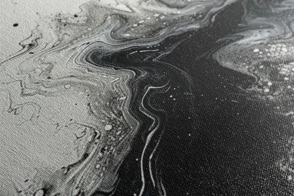 a close up of a black and white painting