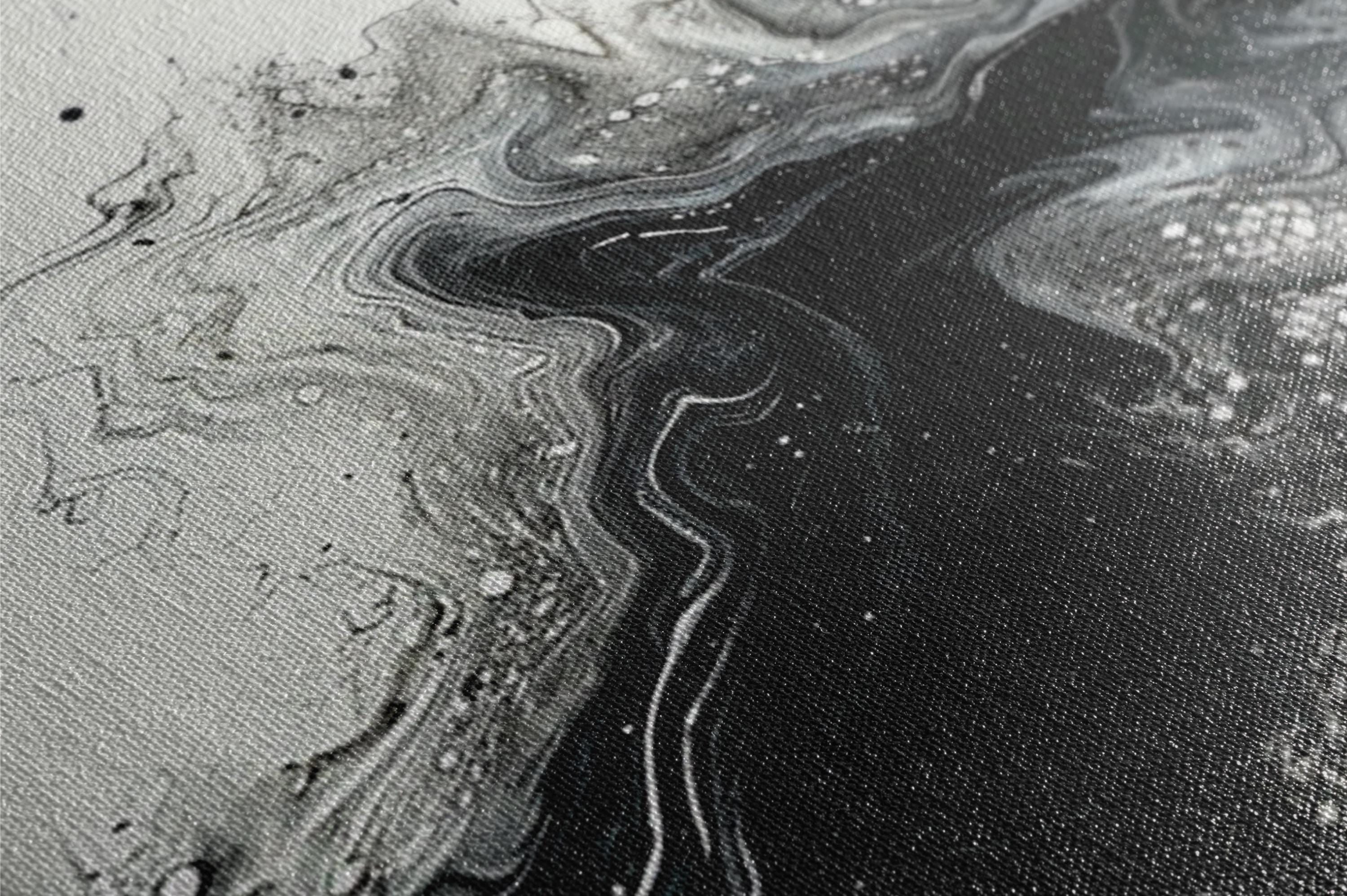 a close up of a black and white painting