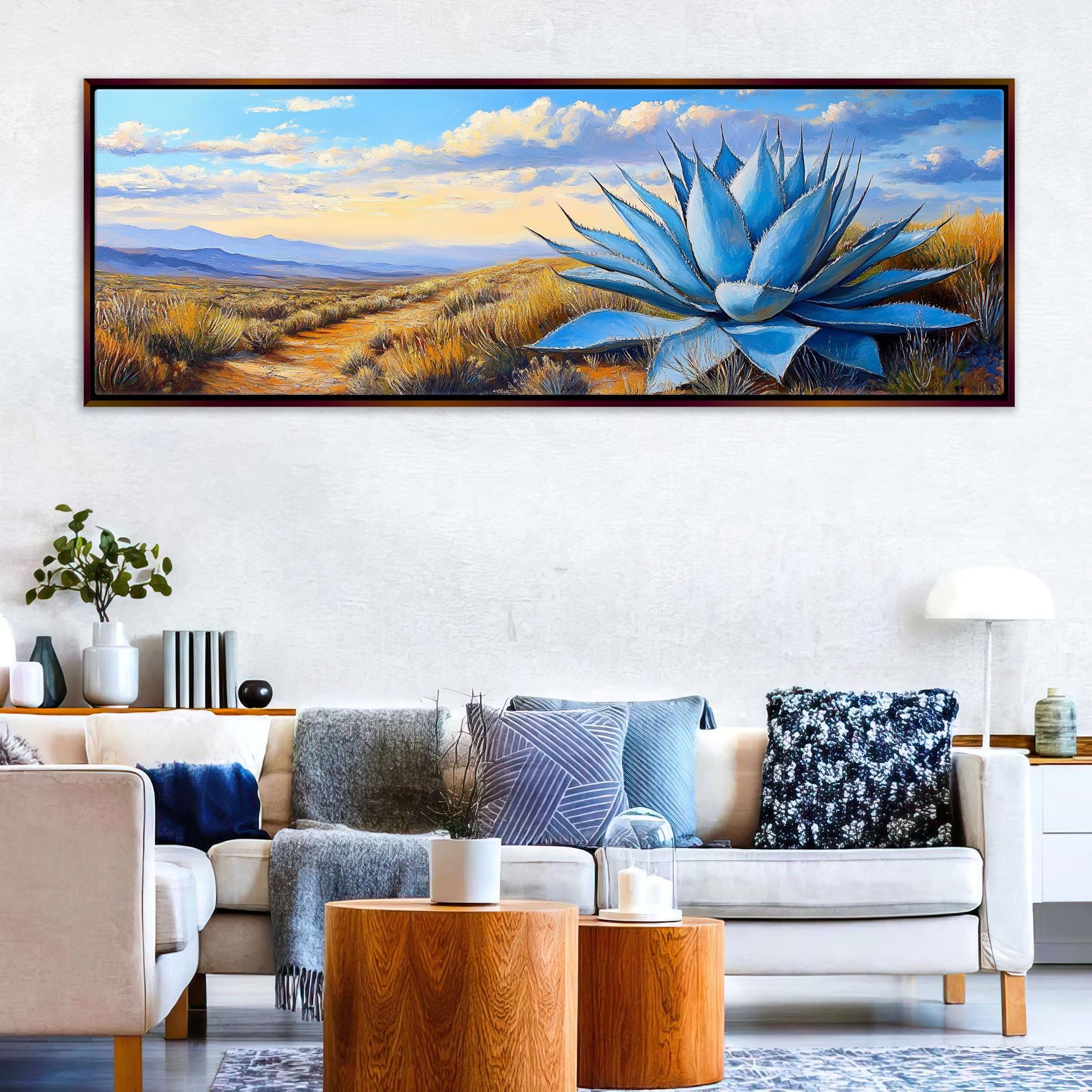 a living room with a couch and a painting on the wall