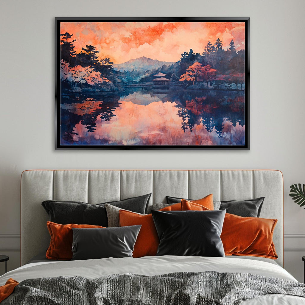 a bed with a painting on the wall above it