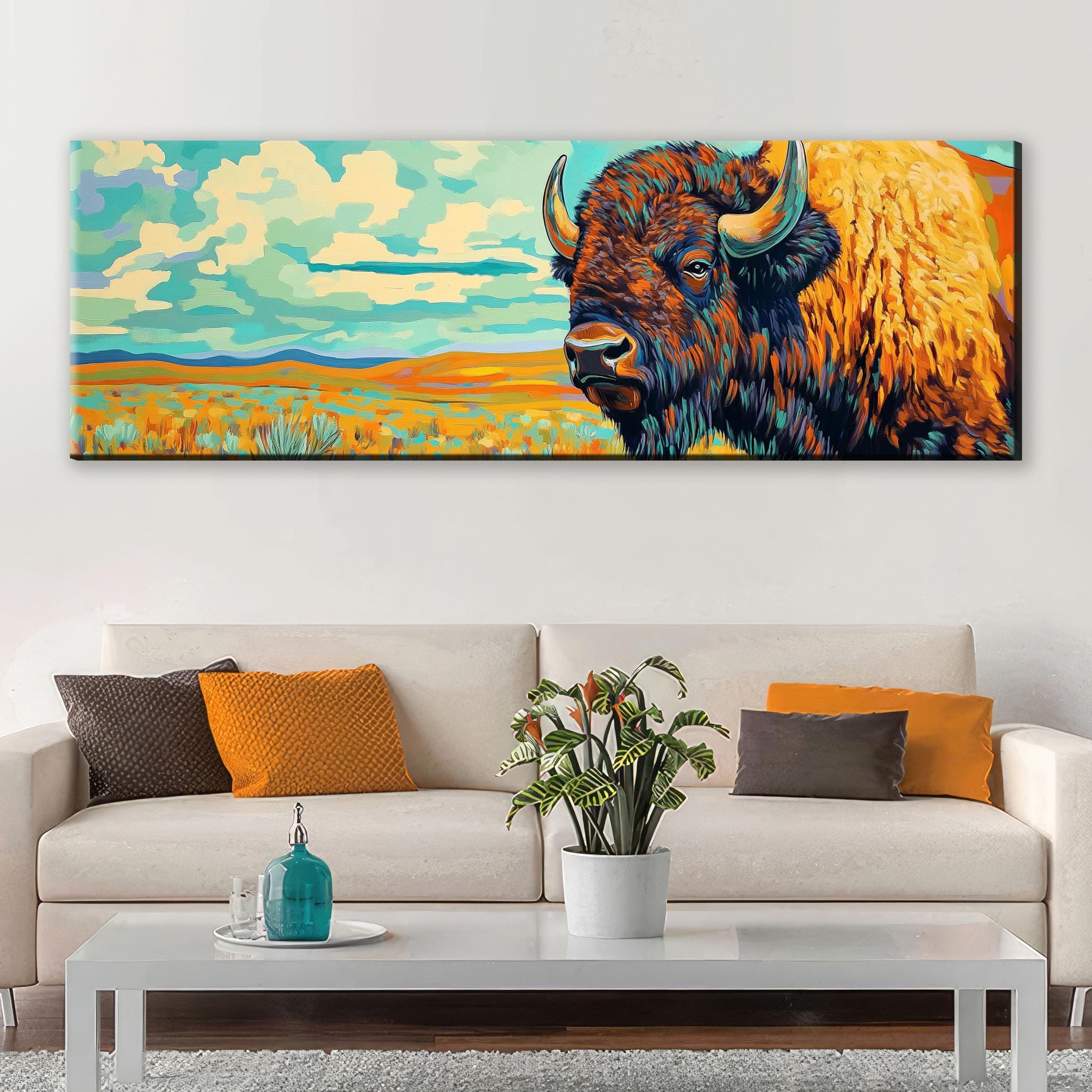 a living room with a couch and a painting on the wall