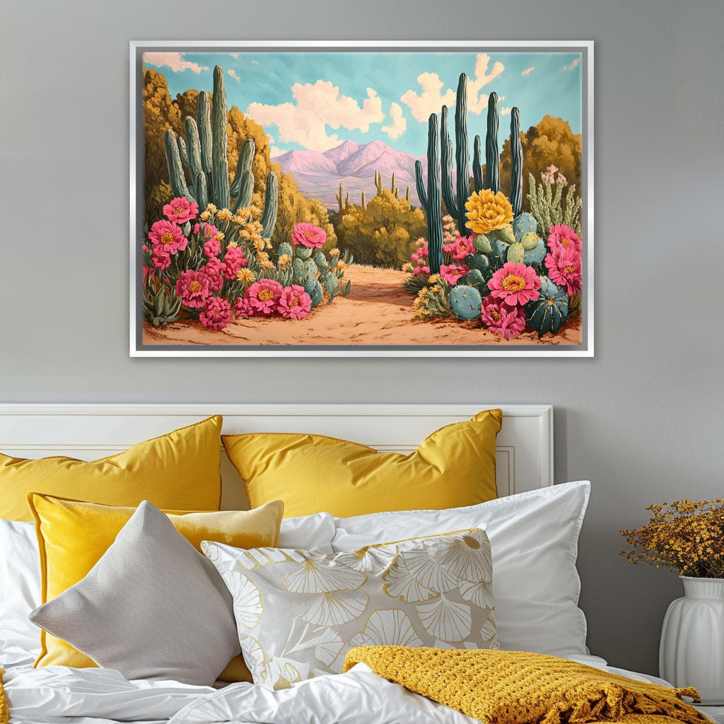 a painting of a desert scene on a wall above a bed