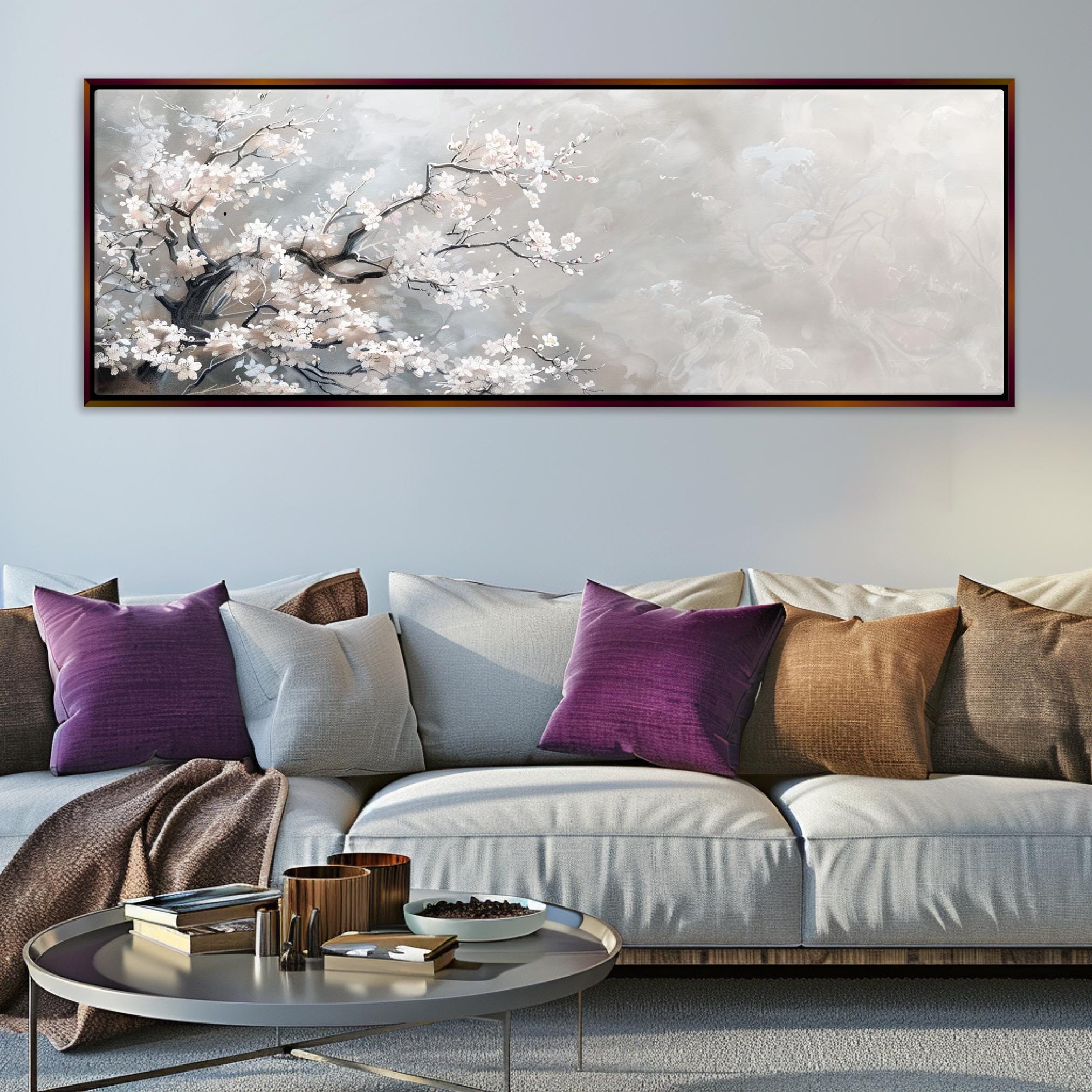 a living room with a couch and a painting on the wall