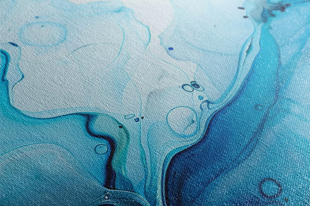 a close up of a blue and white painting