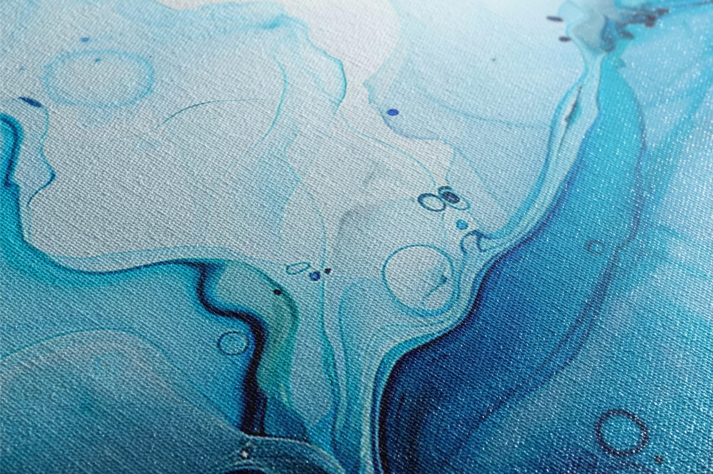 a close up of a blue and white painting