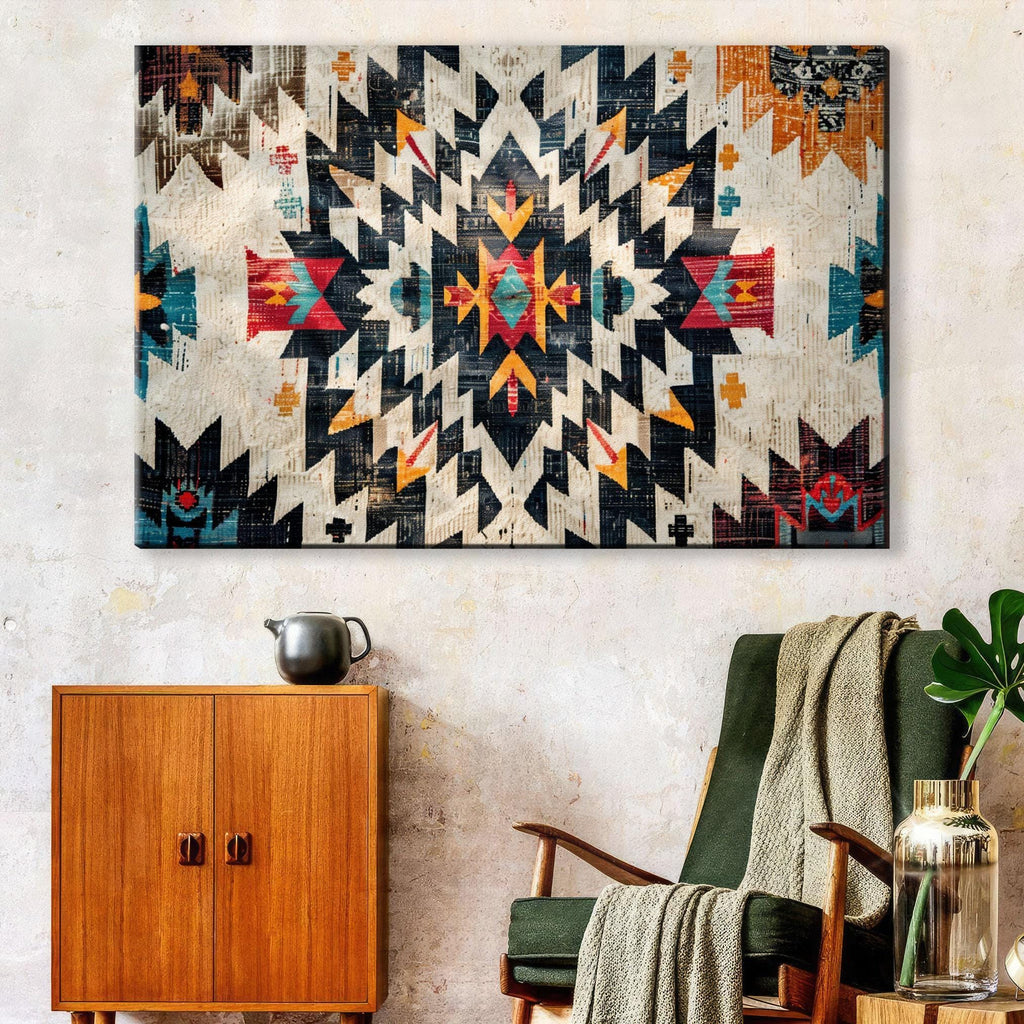 a large, colorful, abstract pattern on the wall, with a wooden cabinet below it and a green armchair in the foreground.