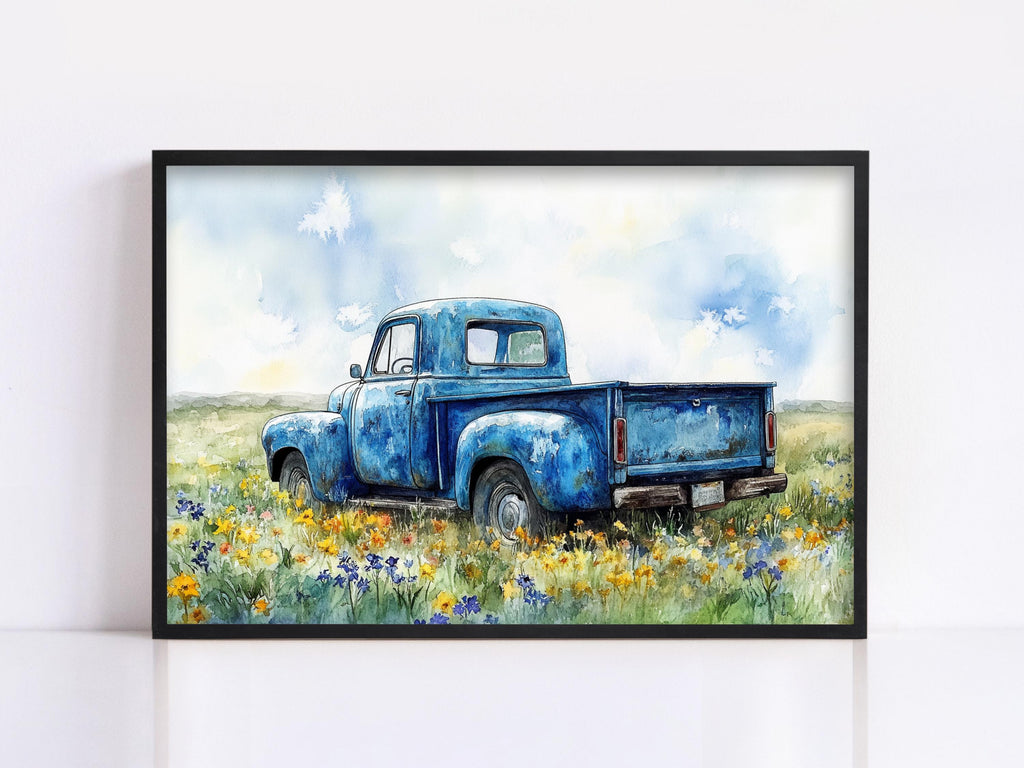 A blue vintage truck is parked in a field of yellow flowers, with a cloudy sky in the background.