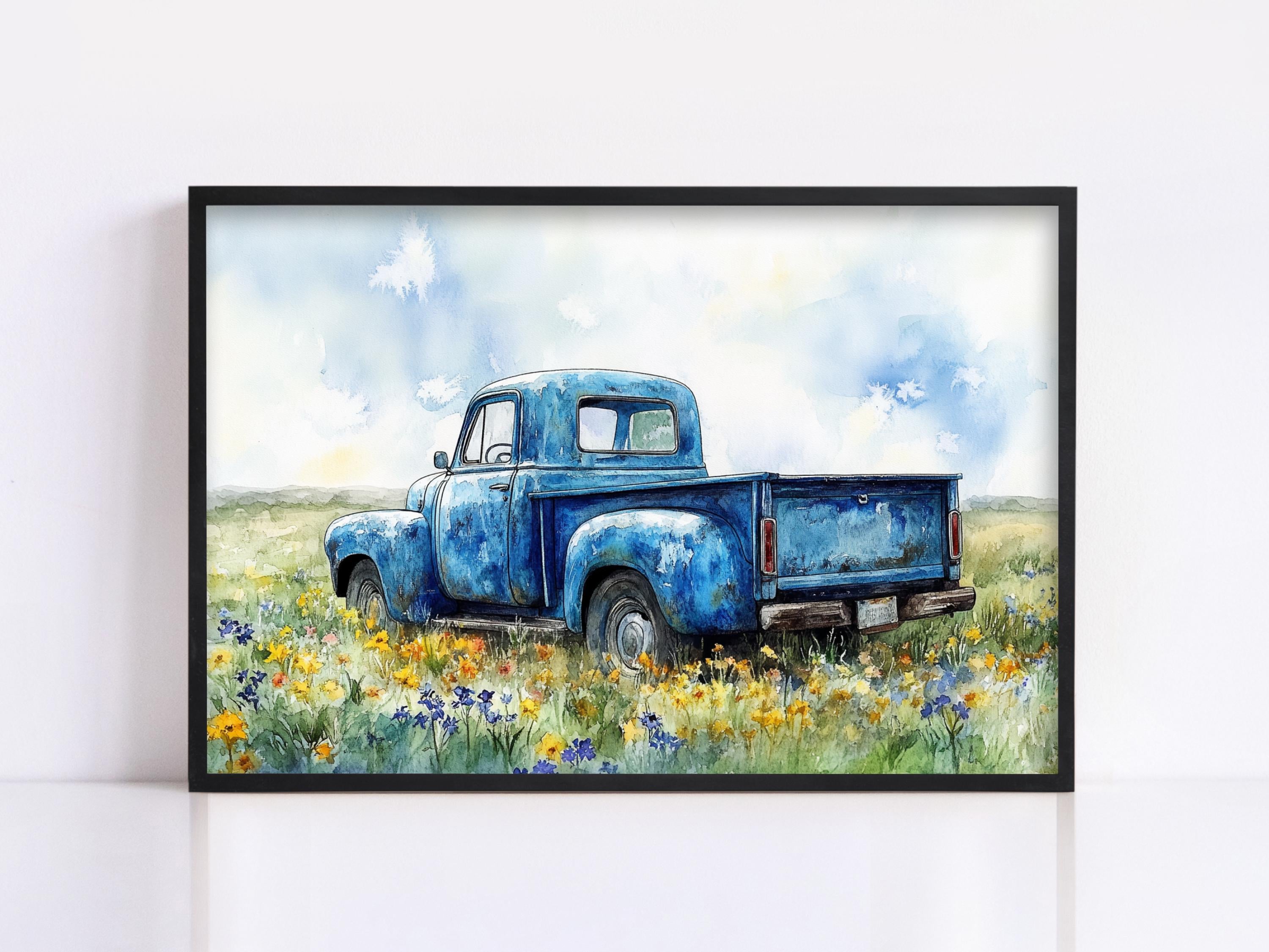 A blue vintage truck is parked in a field of yellow flowers, with a cloudy sky in the background.