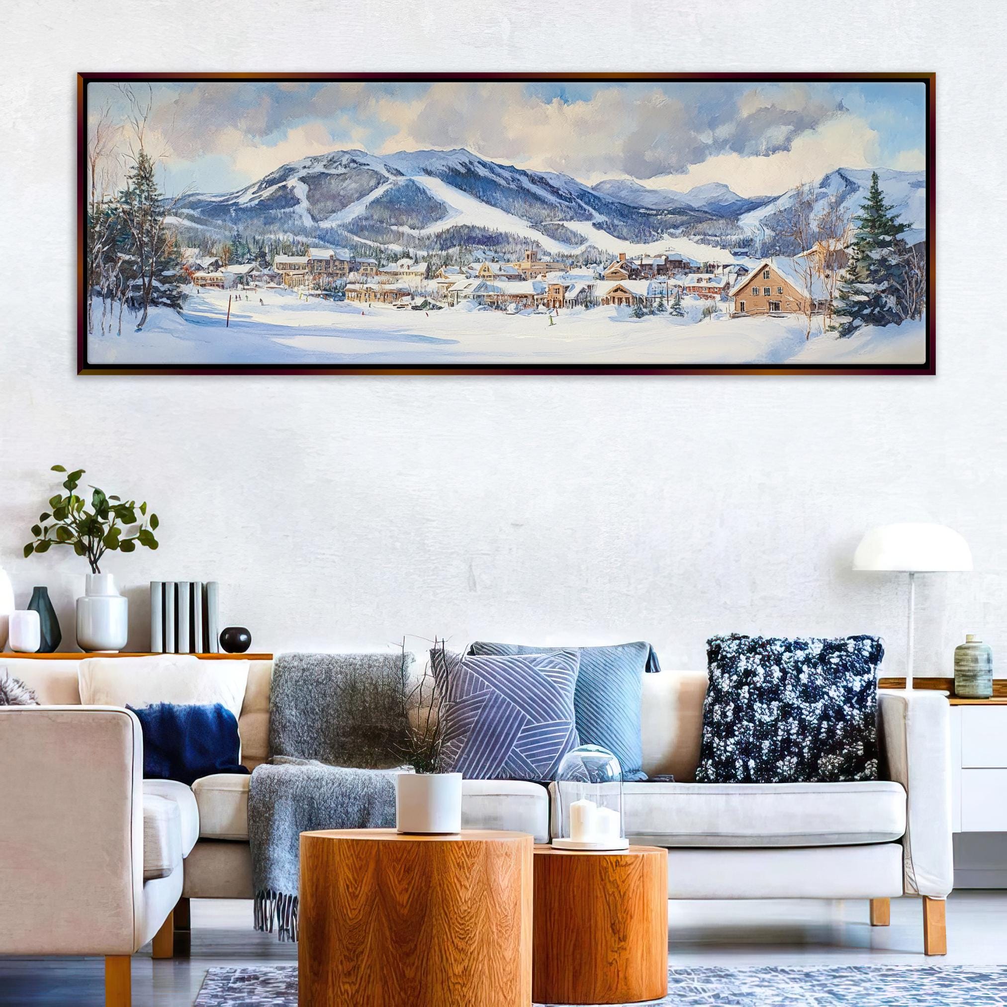 a living room with a painting on the wall