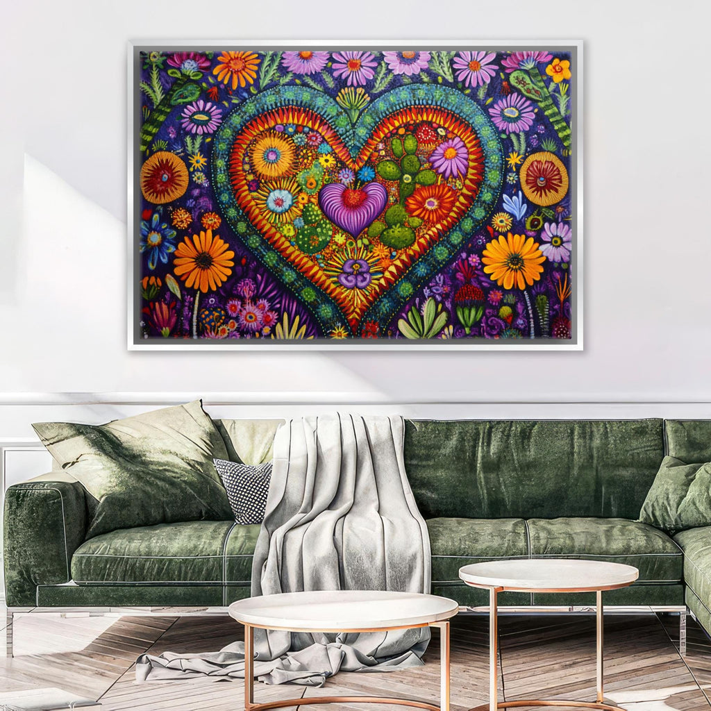 a living room with a green couch and a painting on the wall