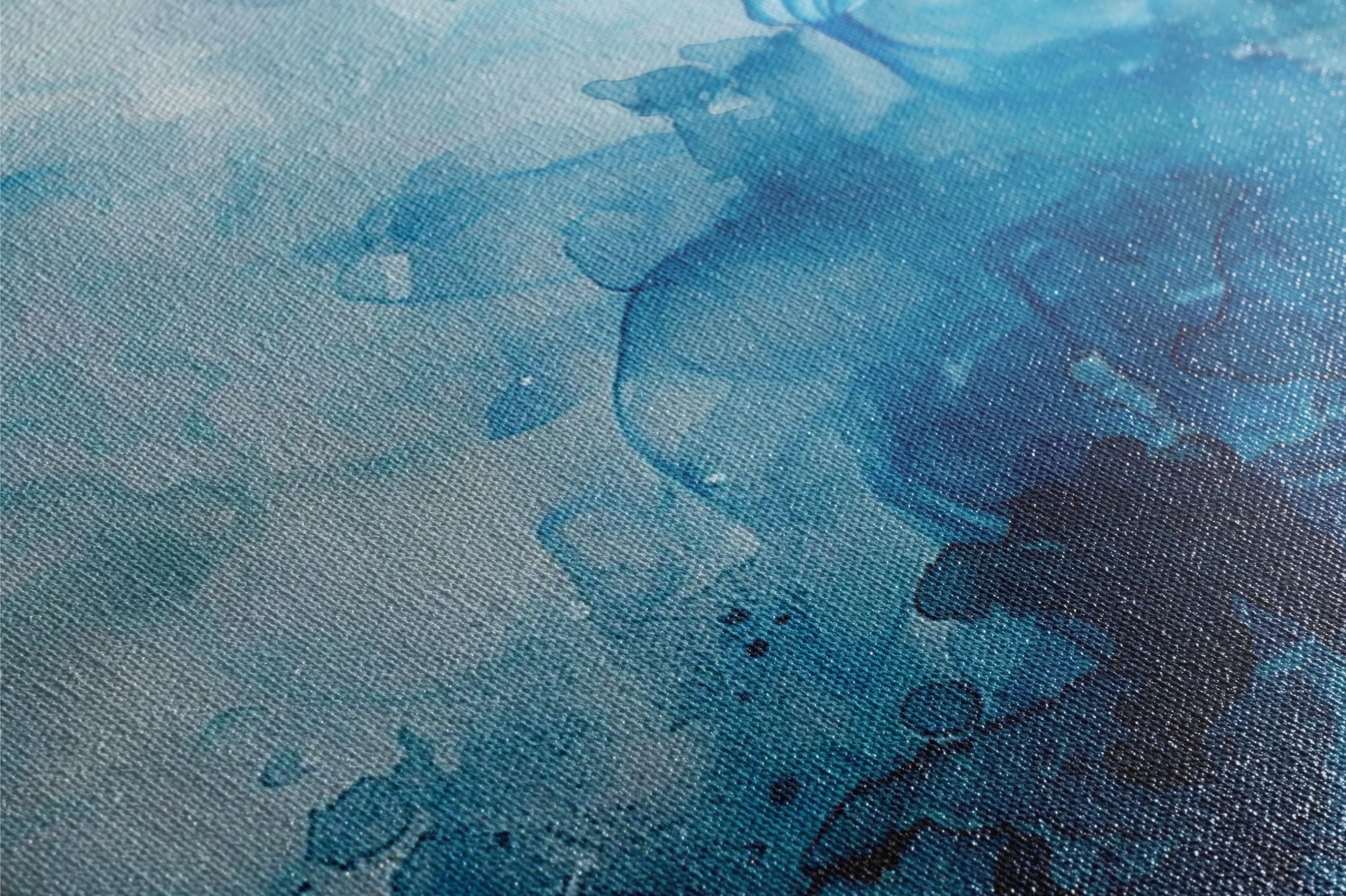 a close up of a piece of paper with a painting on it