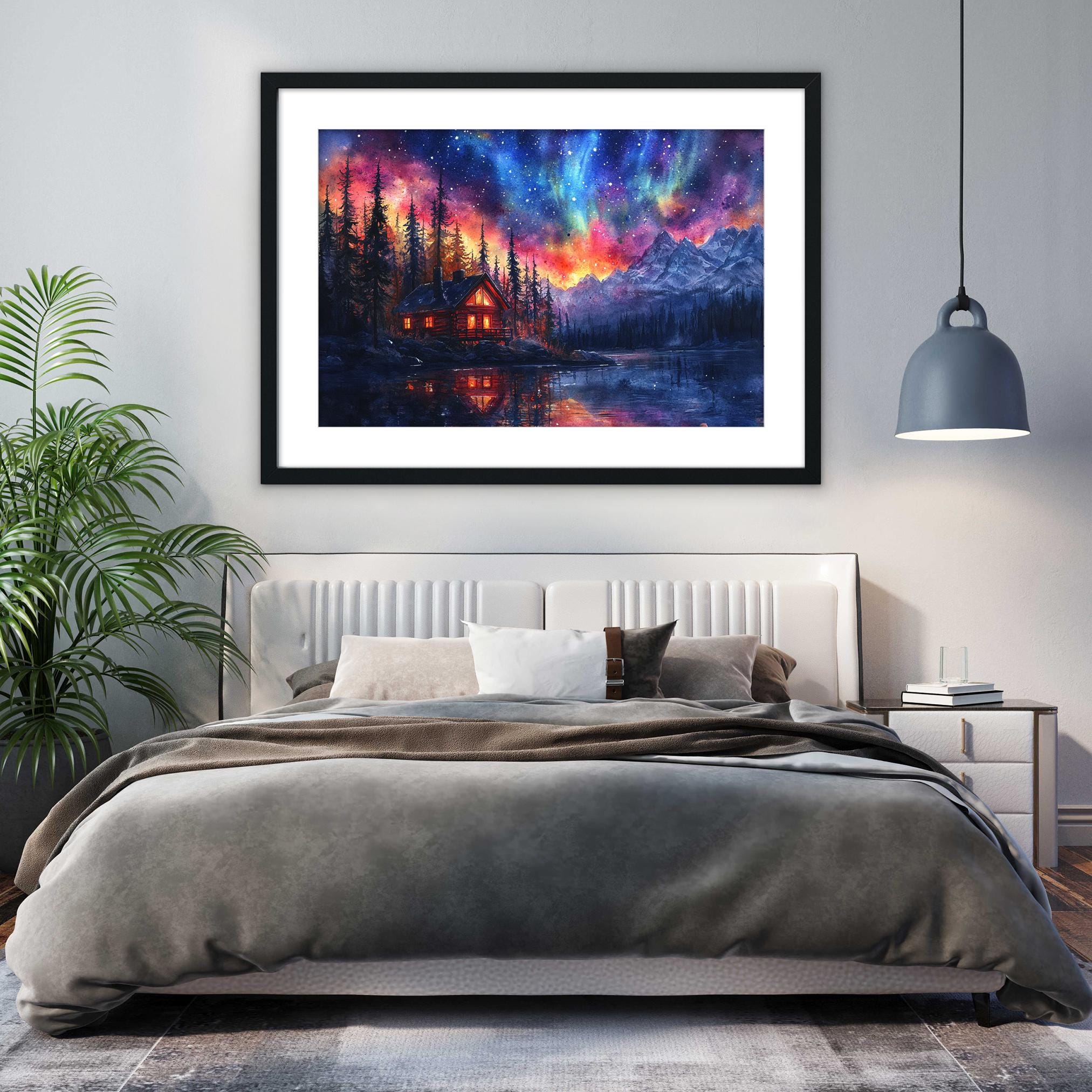 a bedroom with a large bed, a framed painting of a cabin in the background, and a potted plant on the left side of the room.