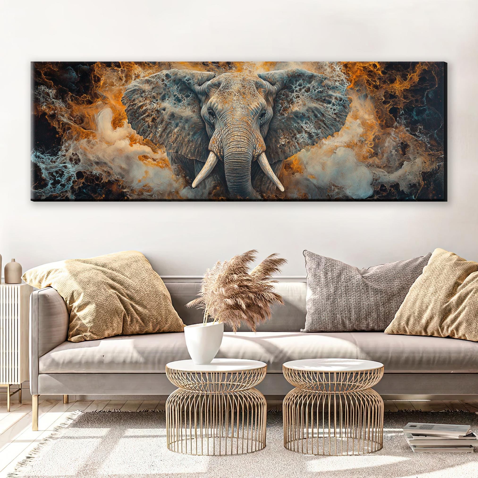 a painting of an elephant on a wall above a couch