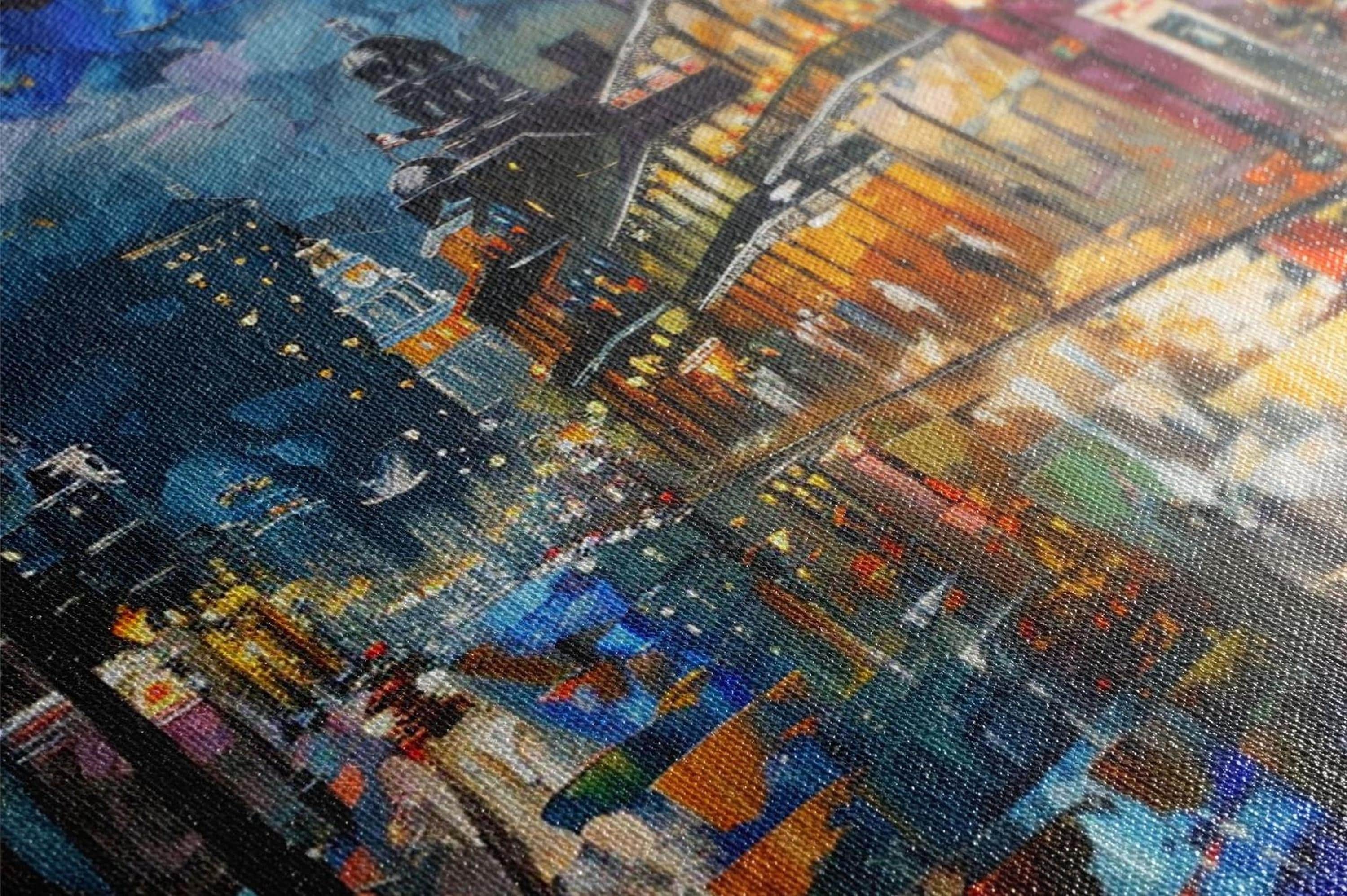 The image is a vibrant, colorful painting depicting a bustling city scene with a mix of architectural elements, streetlights, and people.