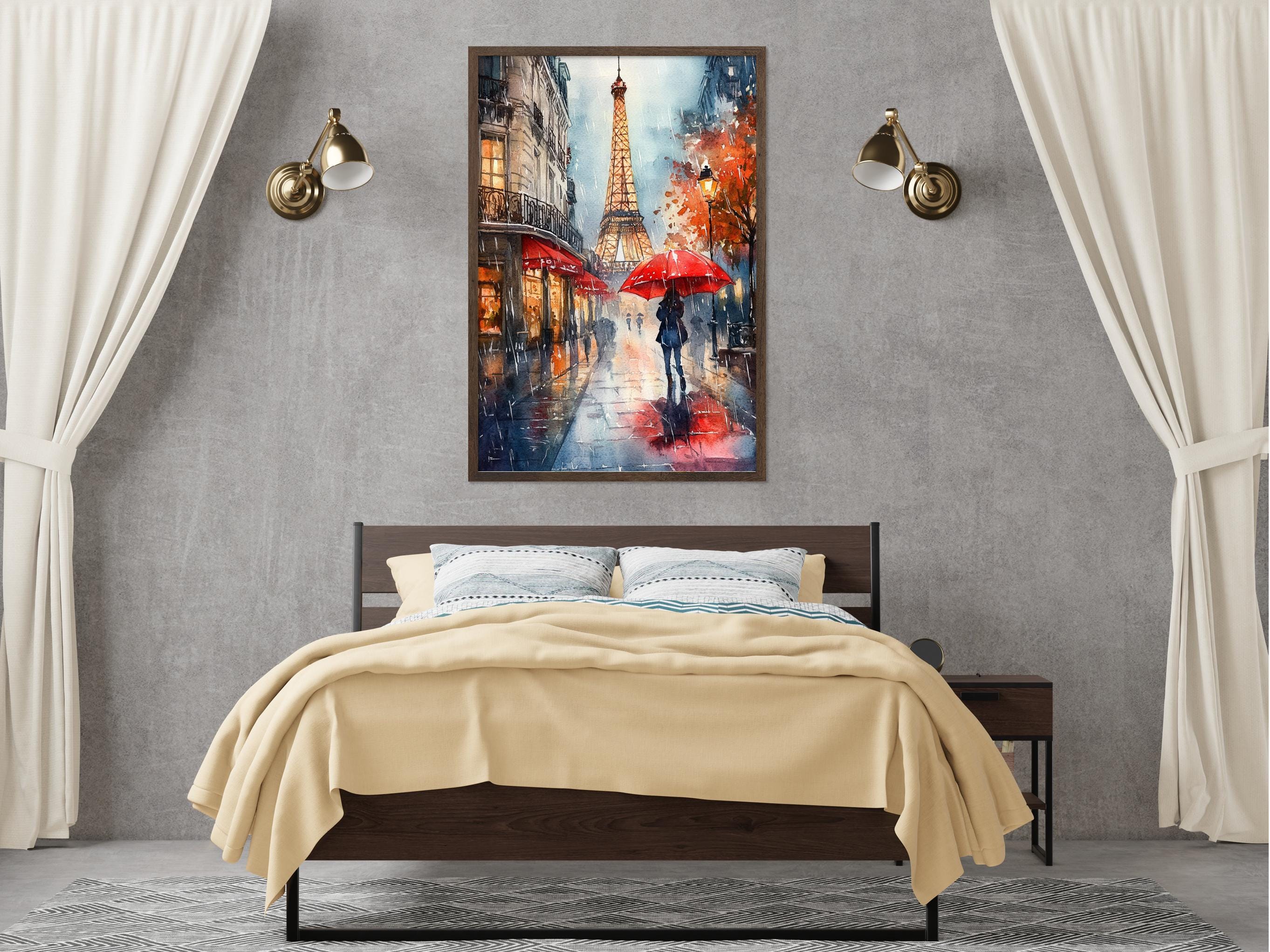a bedroom with a large bed, a nightstand, and a framed painting of a rainy street scene with a person holding an umbrella.