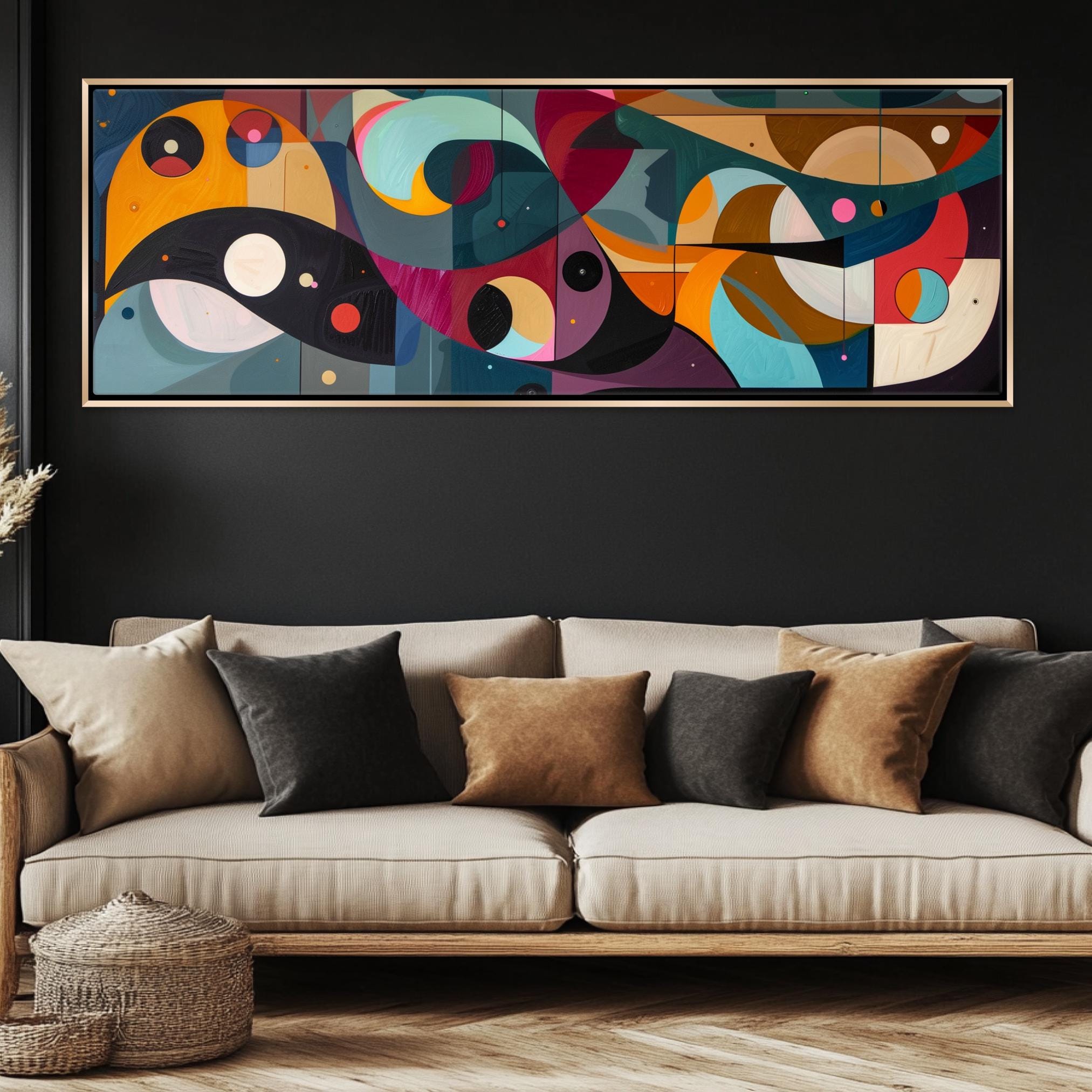 a living room with a couch and a painting on the wall