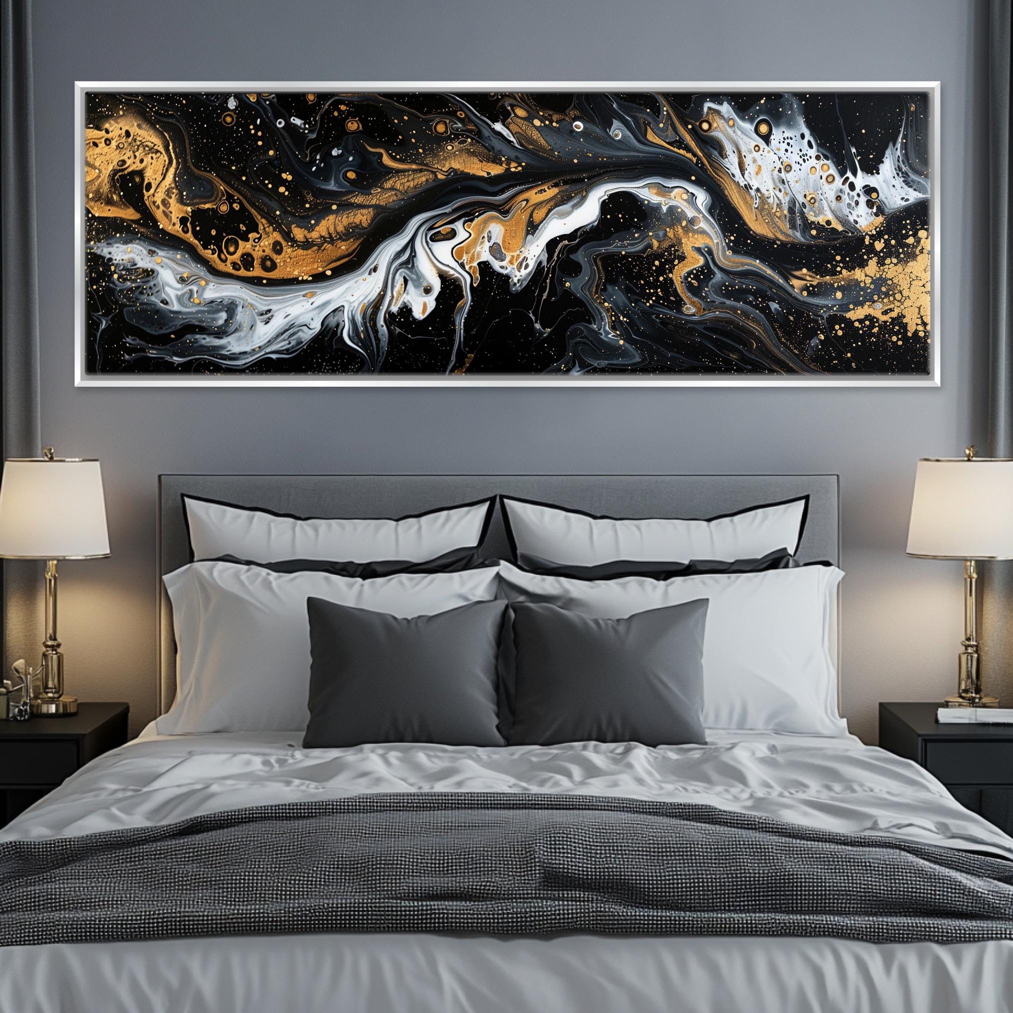 a bedroom with a large painting on the wall above the bed