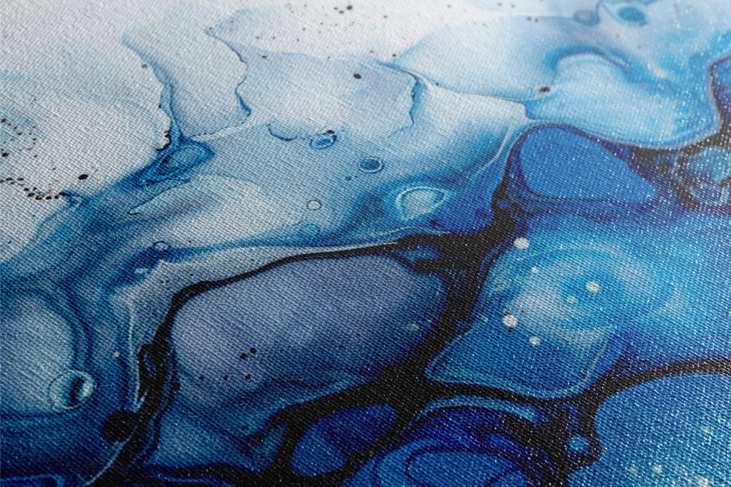 a close up of a blue and white painting