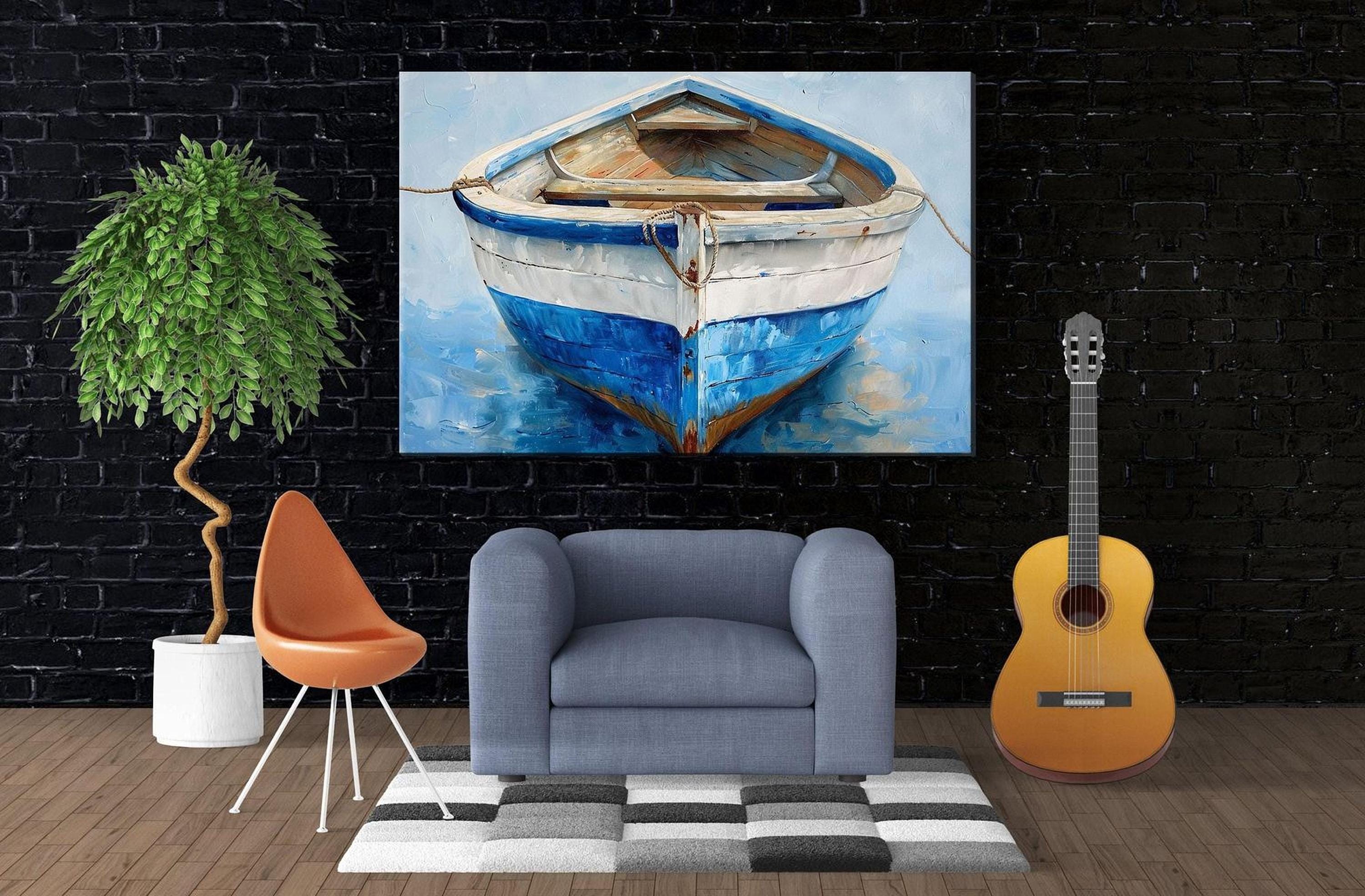 a living room with a large painting of a blue and white boat hanging on the wall. The painting is the focal point of the room, with a gray armchair and a potted plant placed in front of it. To the right of the painting, there is a guitar, and on the left side, there is a chair. The room has a black brick wall, and a rug is placed on the floor in front of the gray armchair.