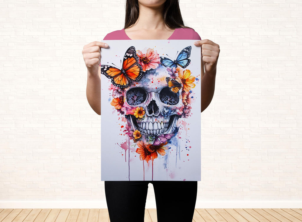 A woman holds up a colorful poster featuring a skull with butterflies and flowers.