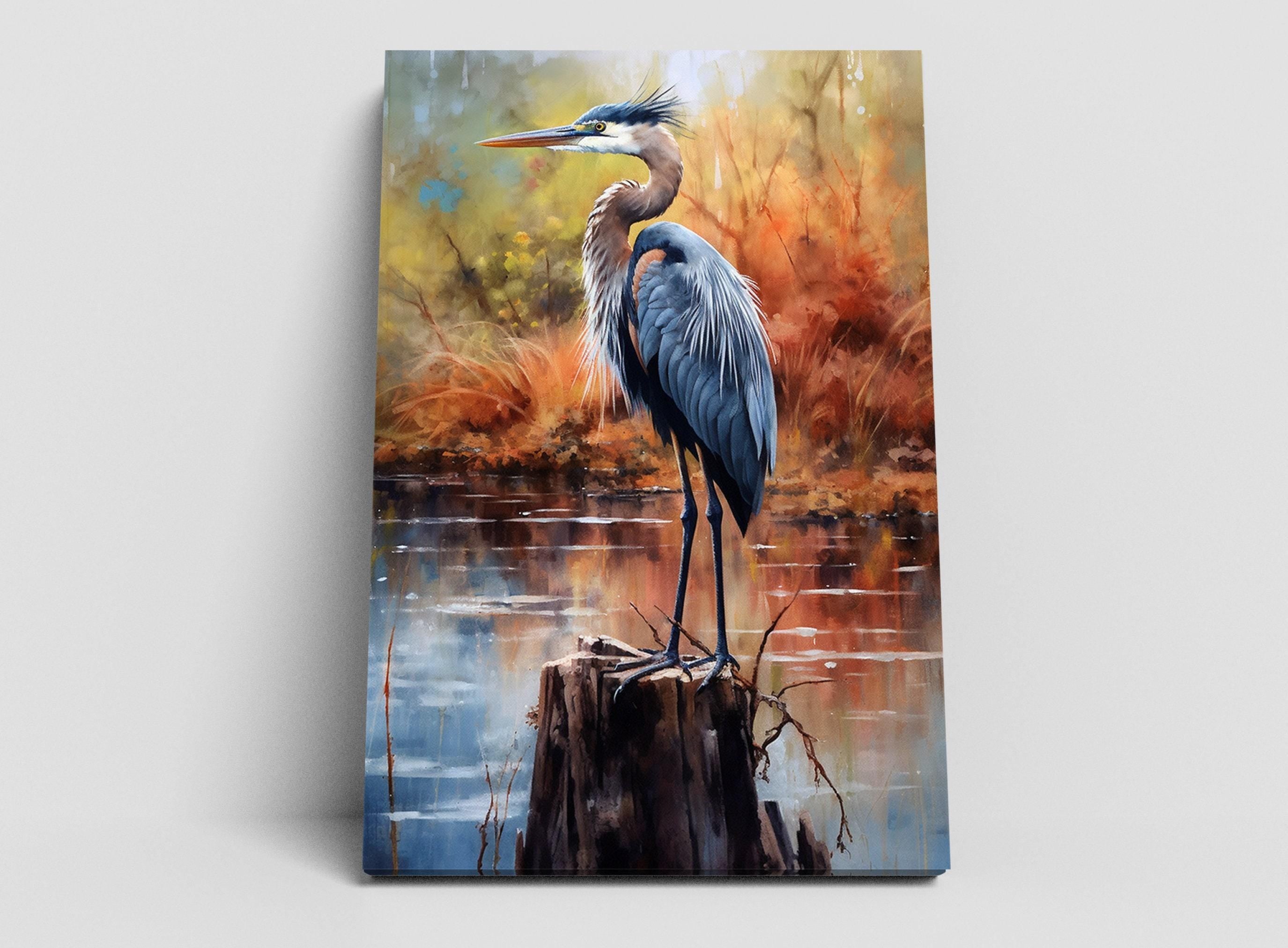 A blue heron standing on a tree stump in a natural setting with a body of water in the background.