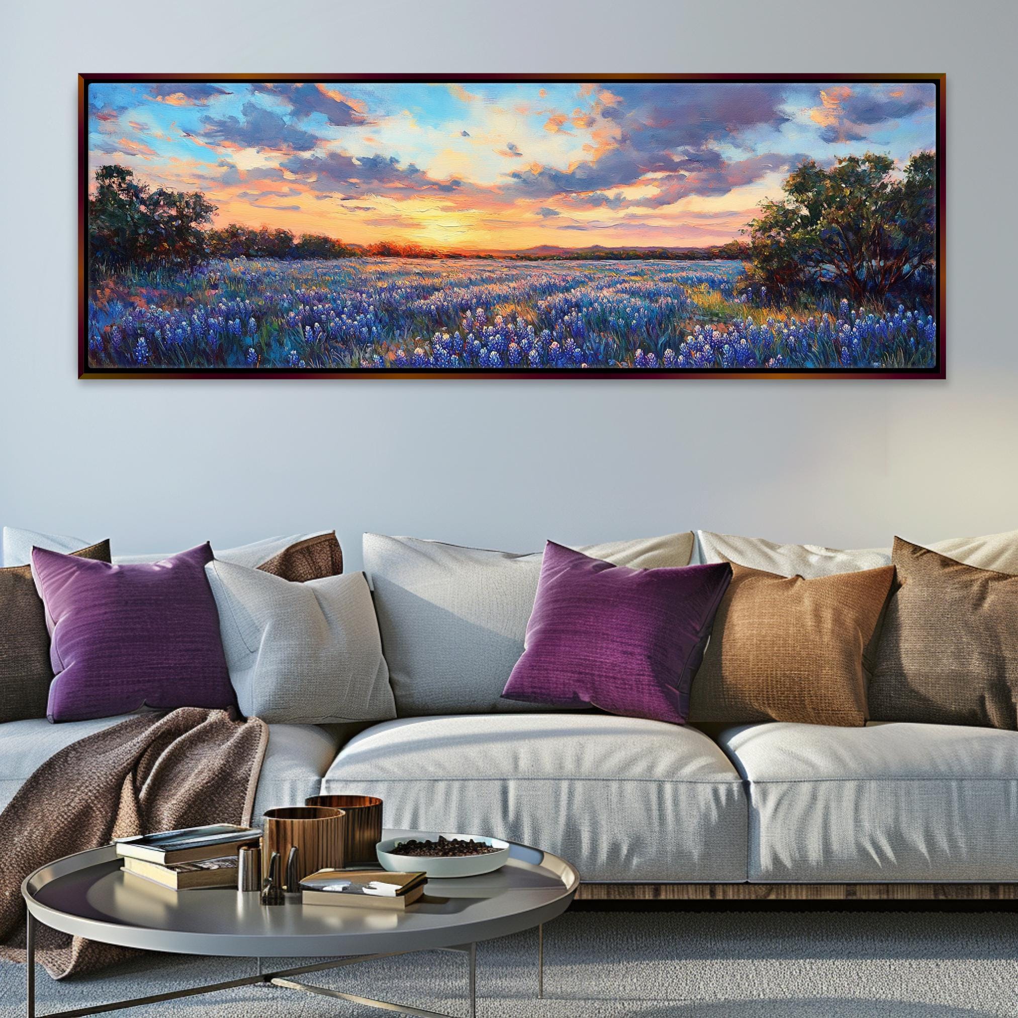 a living room with a couch and a painting on the wall