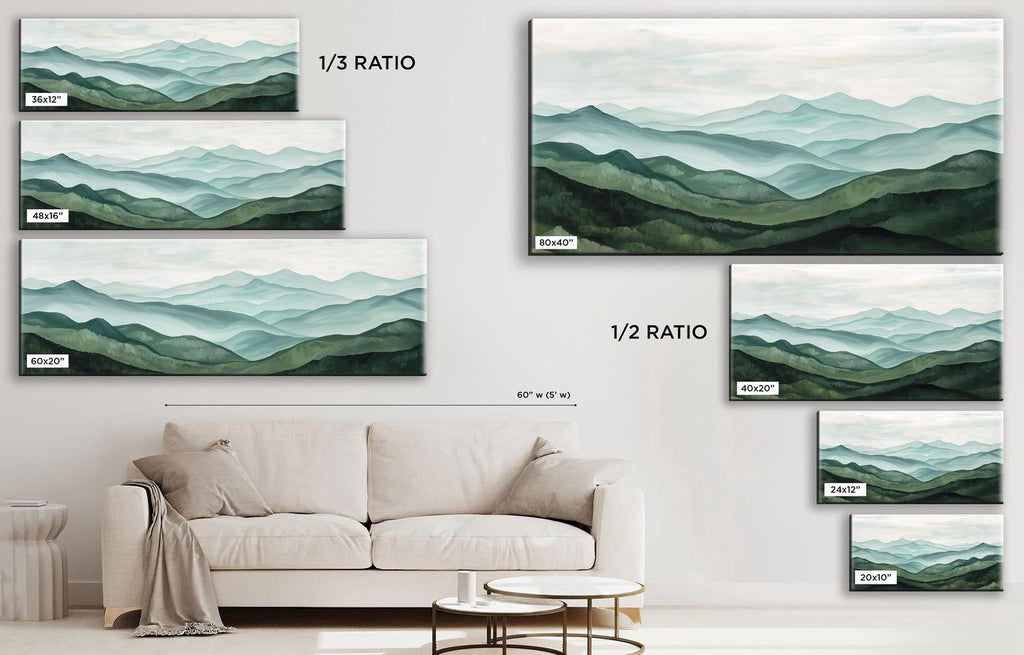 a living room with a couch and paintings on the wall