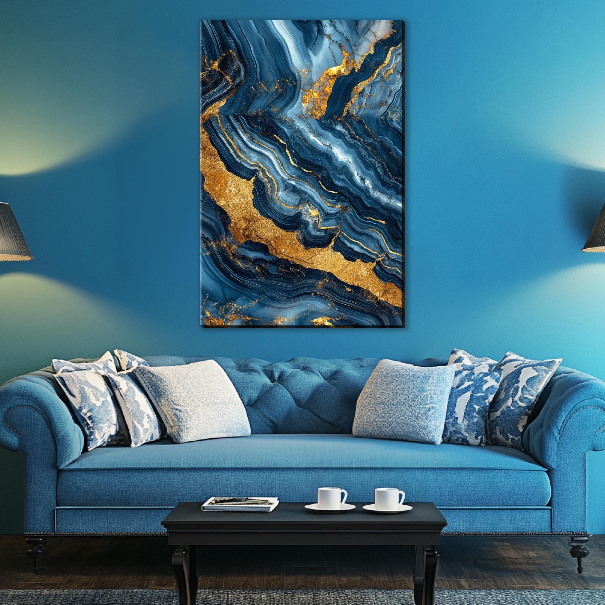 a living room with a blue couch and a painting on the wall