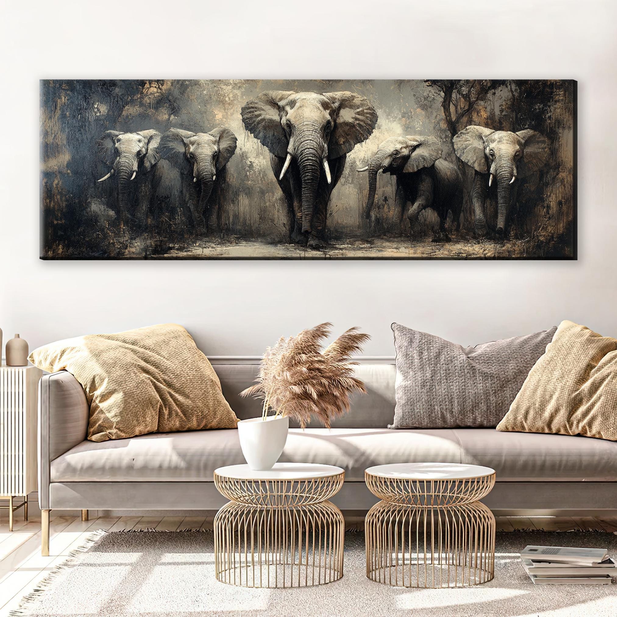 a living room with a couch and a painting on the wall