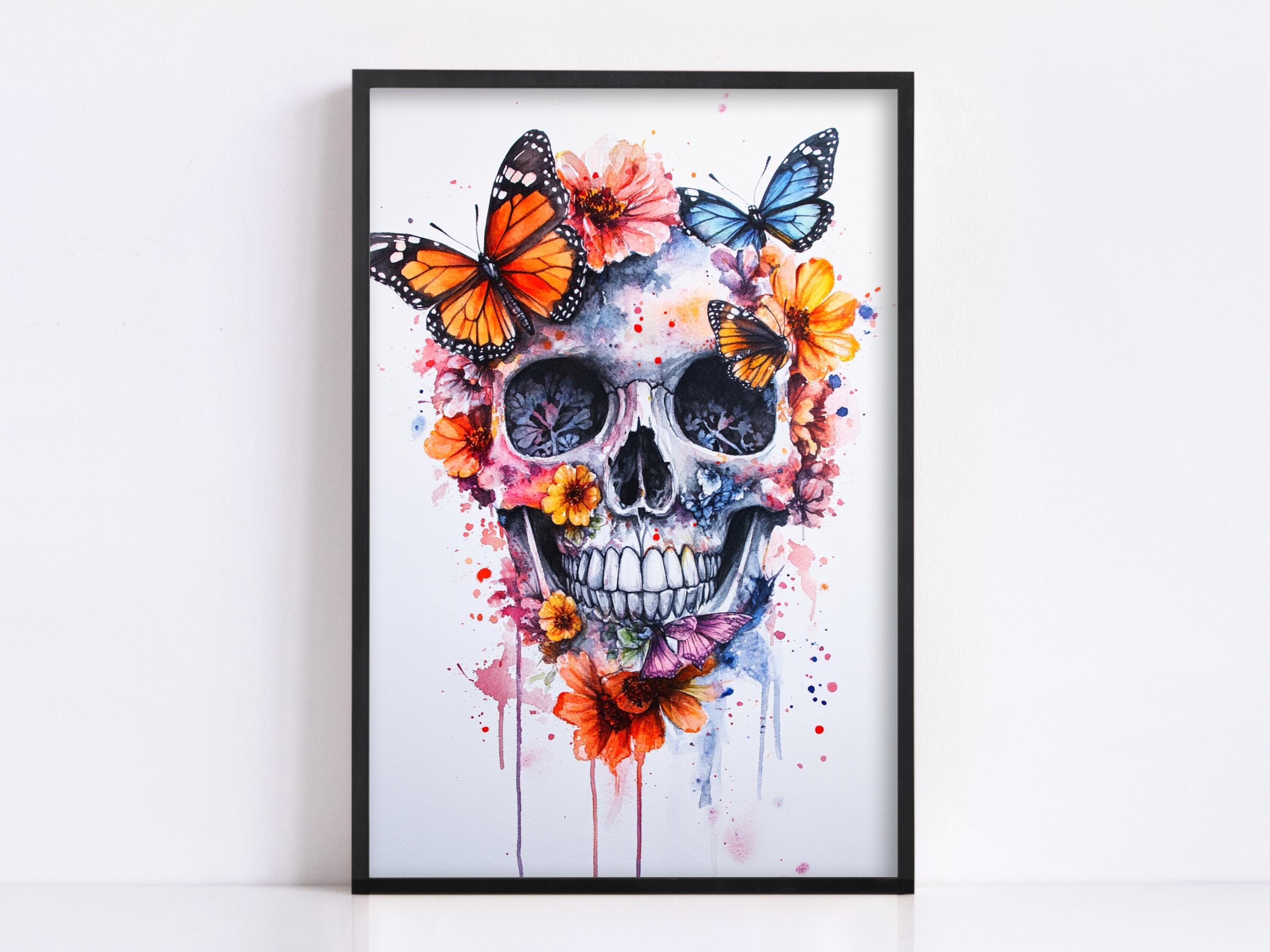 A framed artwork depicting a colorful and intricate skull surrounded by butterflies and flowers, creating a striking and visually captivating piece.