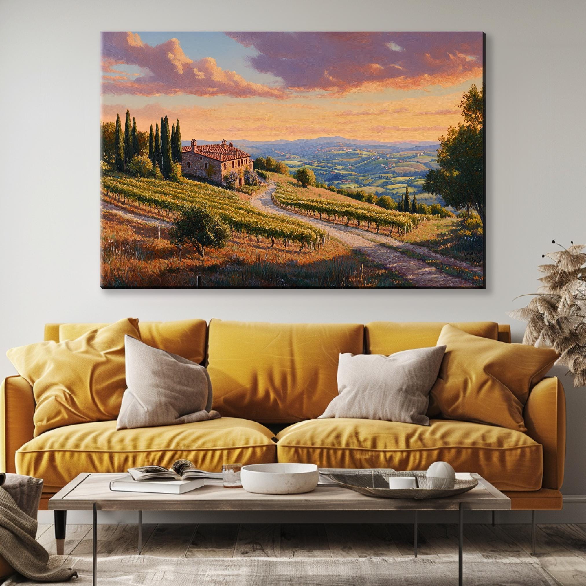a living room with a couch and a painting on the wall