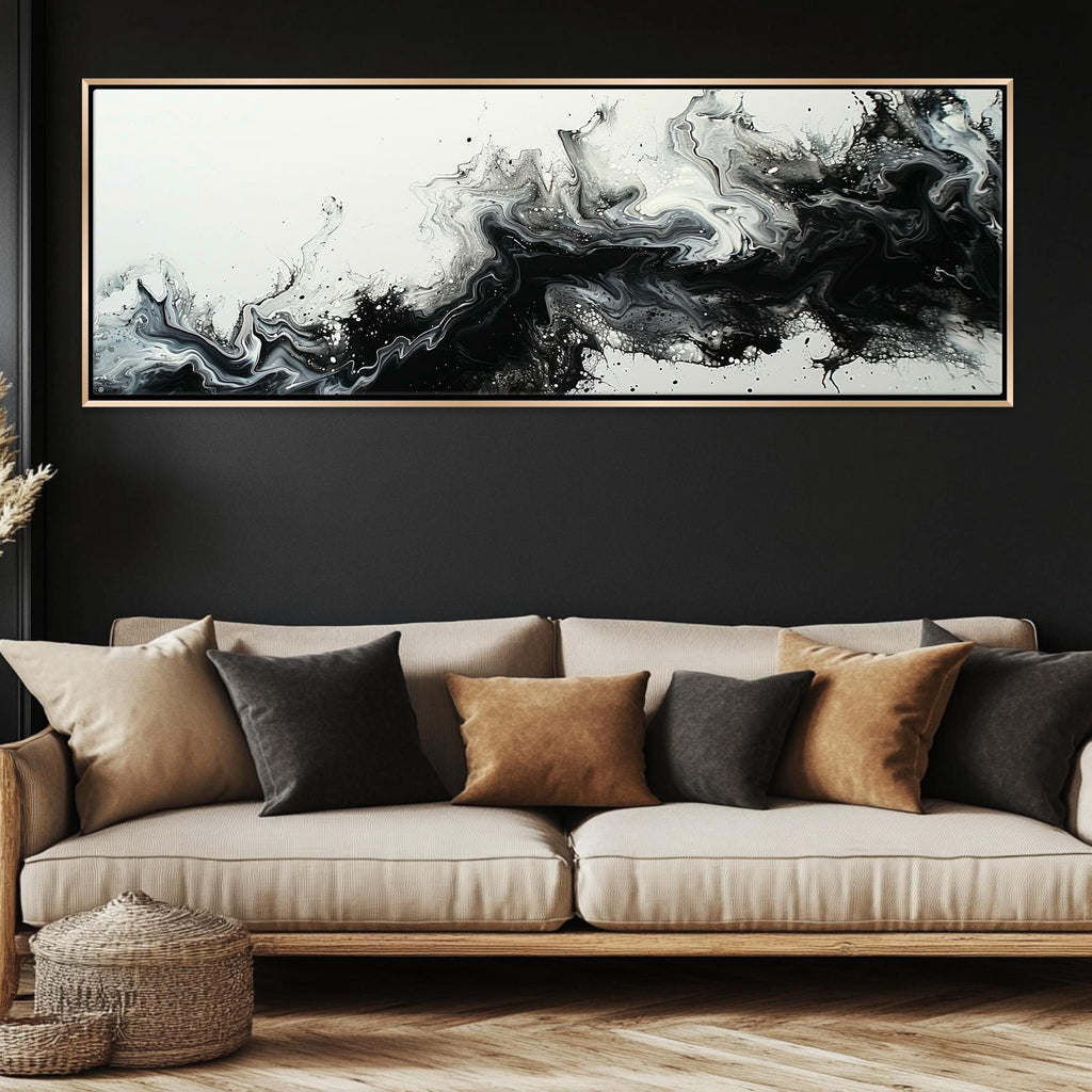 a living room with a couch and a painting on the wall