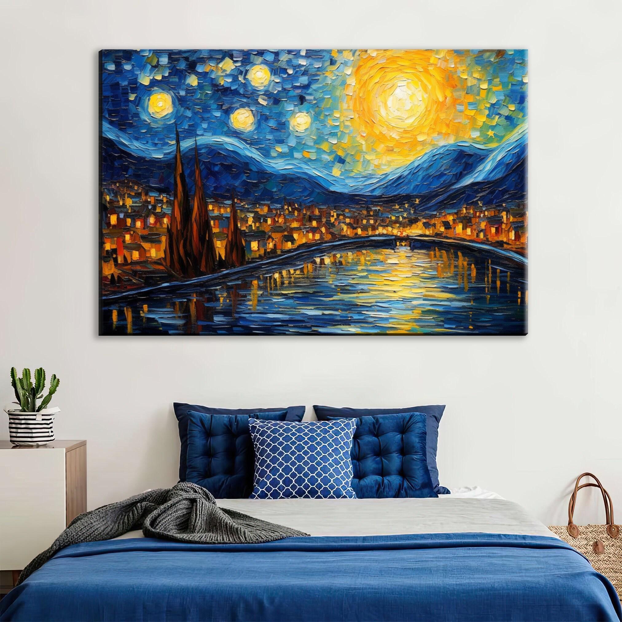 a large, vibrant painting of a night sky with stars and a bright sun, hanging on a wall above a bed with blue bedding and pillows.
