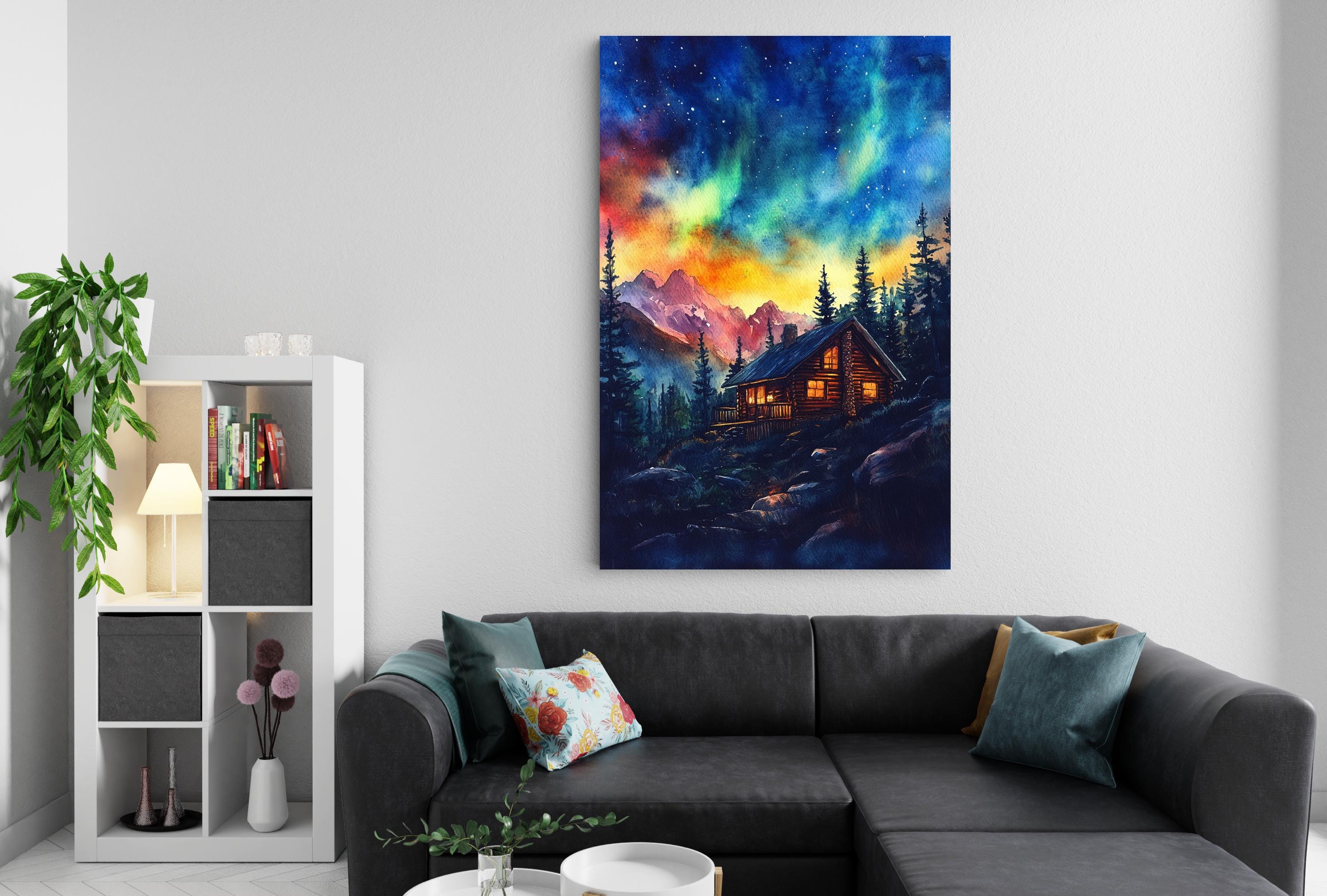a cozy living room with a large, colorful painting of a cabin in the mountains hanging on the wall above a comfortable gray sectional sofa.