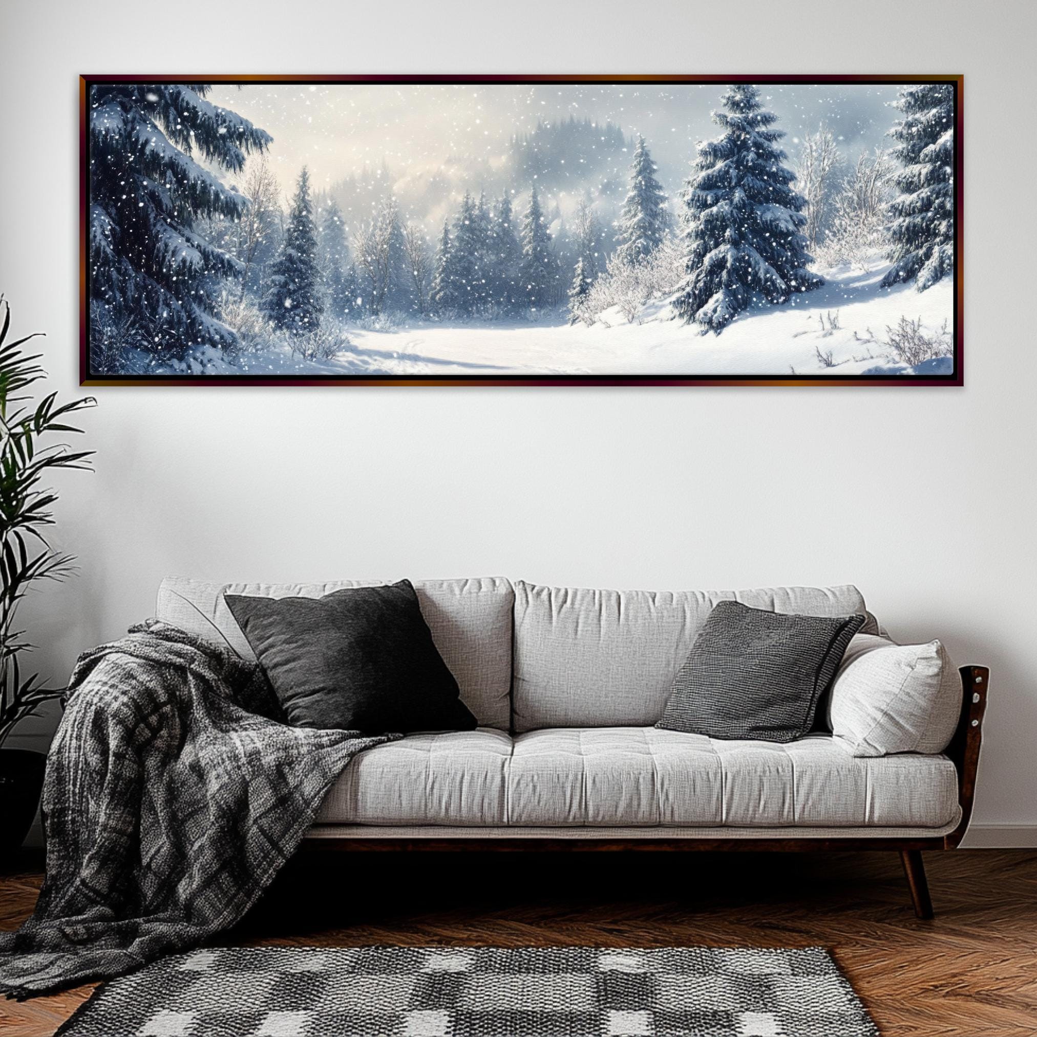 a living room with a couch and a painting on the wall